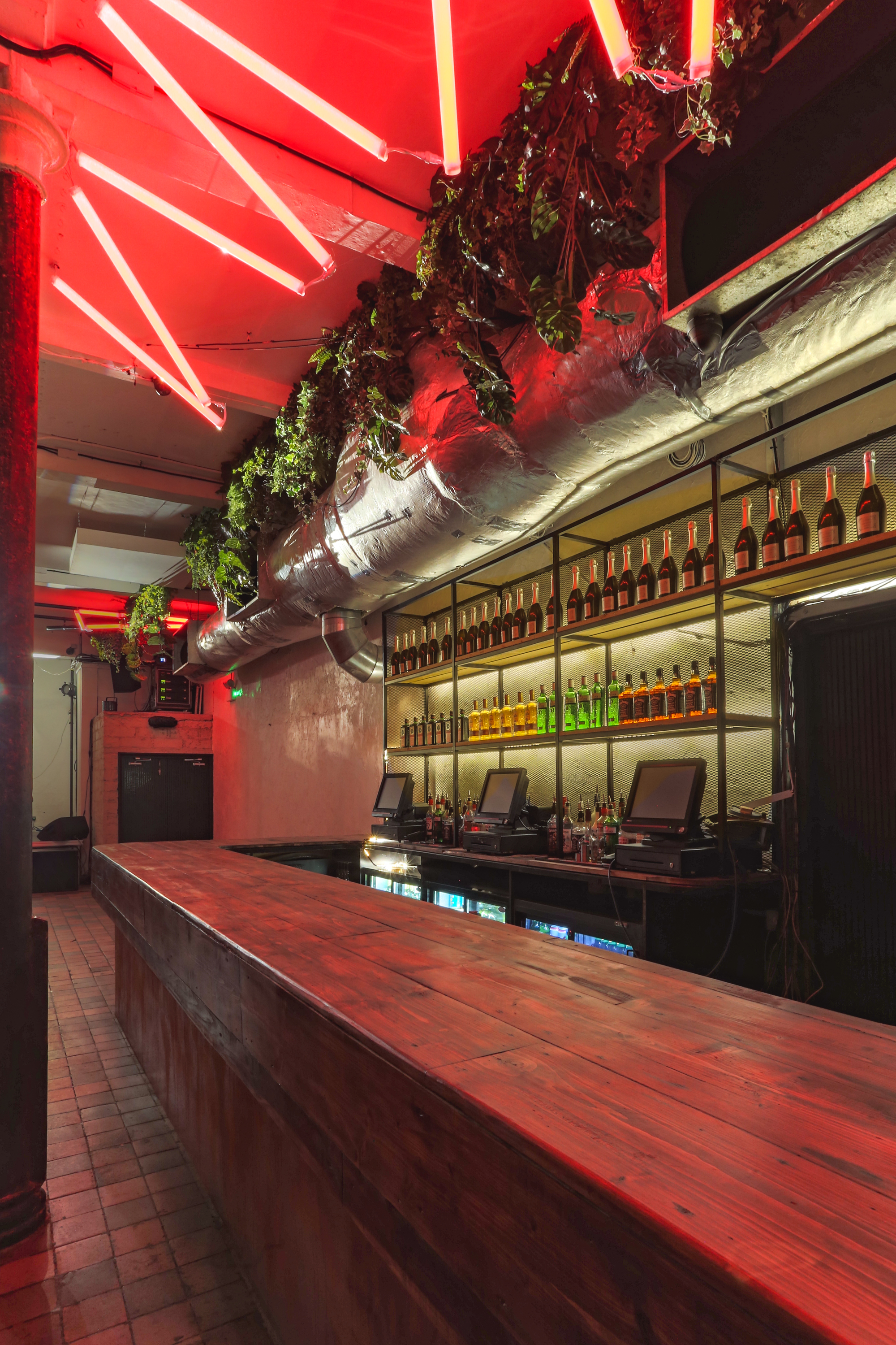 Modern bar at 93 Feet East, ideal for events with vibrant ambiance and extensive beverages.