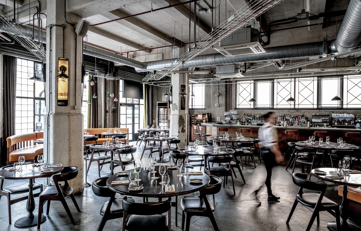 Modern industrial restaurant venue with spacious layout for events in Southwark.
