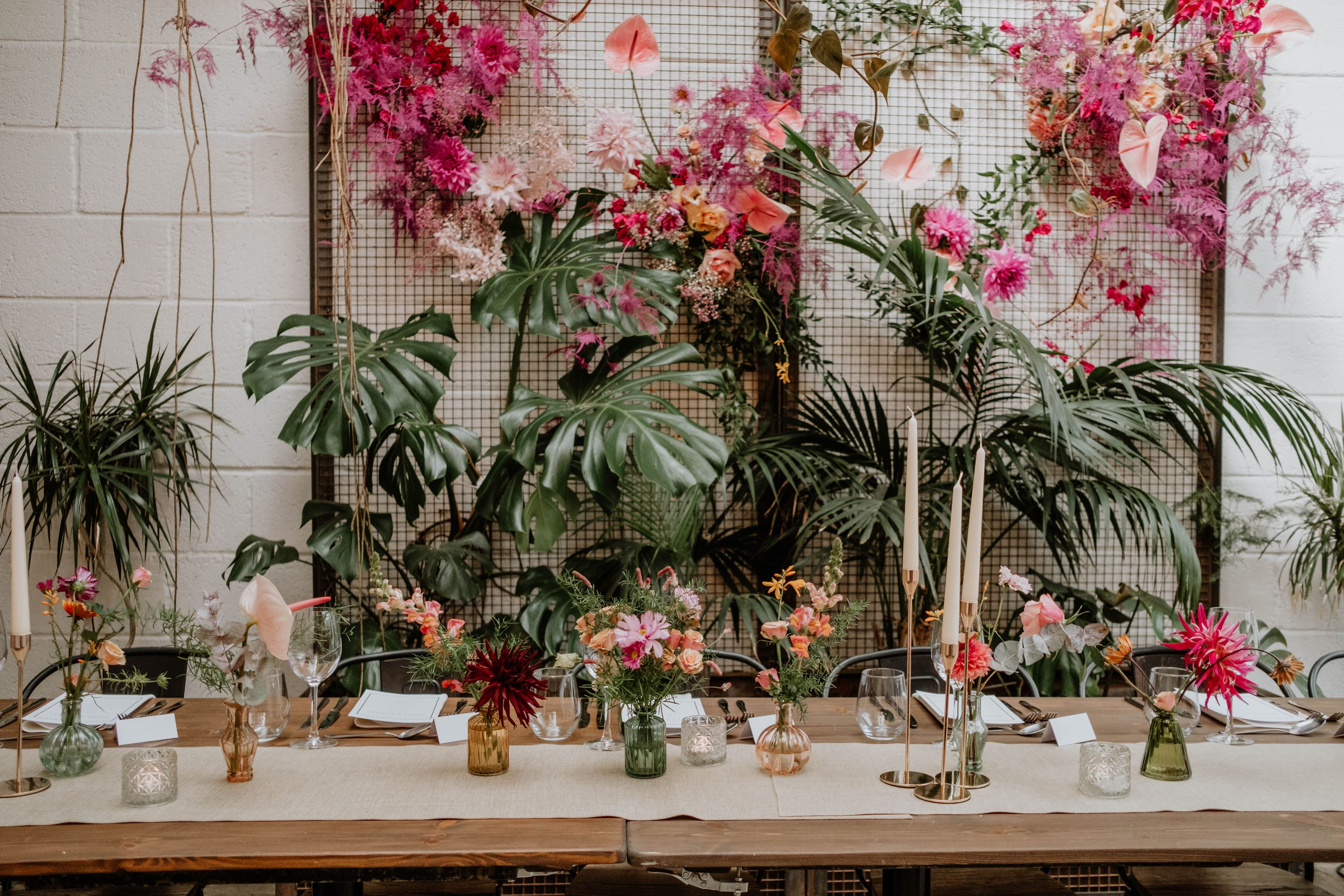 Elegant event space with floral backdrop for intimate gatherings and celebrations.