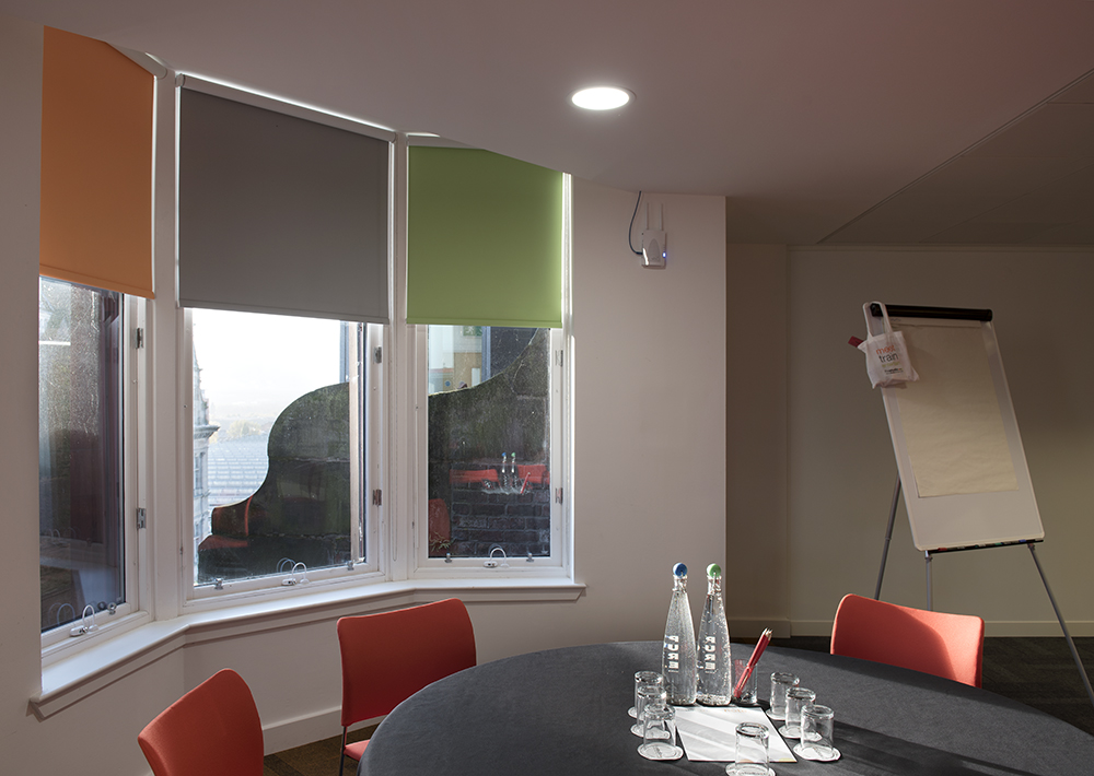 Hope in a vibrant Glasgow meeting room, perfect for workshops and brainstorming sessions.