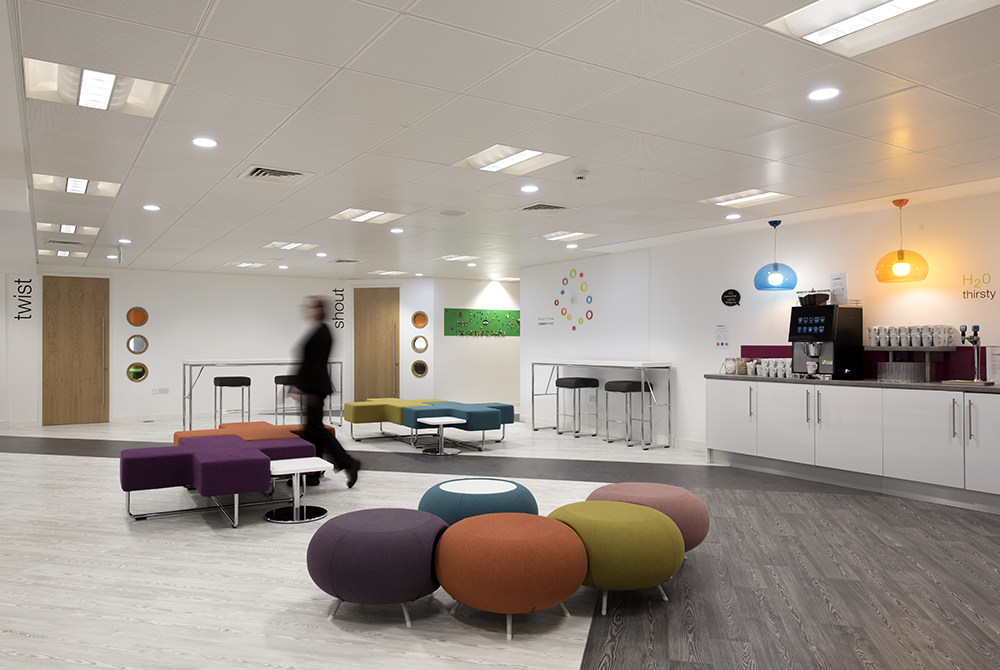 Modern meeting space in Glasgow with vibrant seating for collaboration and networking events.