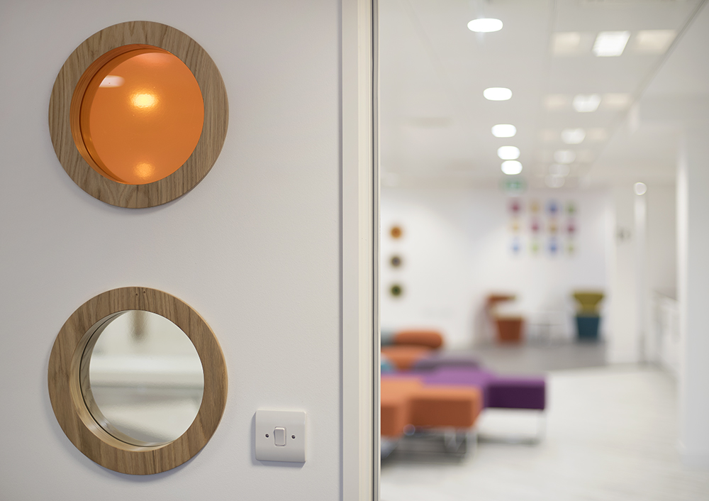 Modern meeting space at Twist in Glasgow with circular mirrors, ideal for creative events.