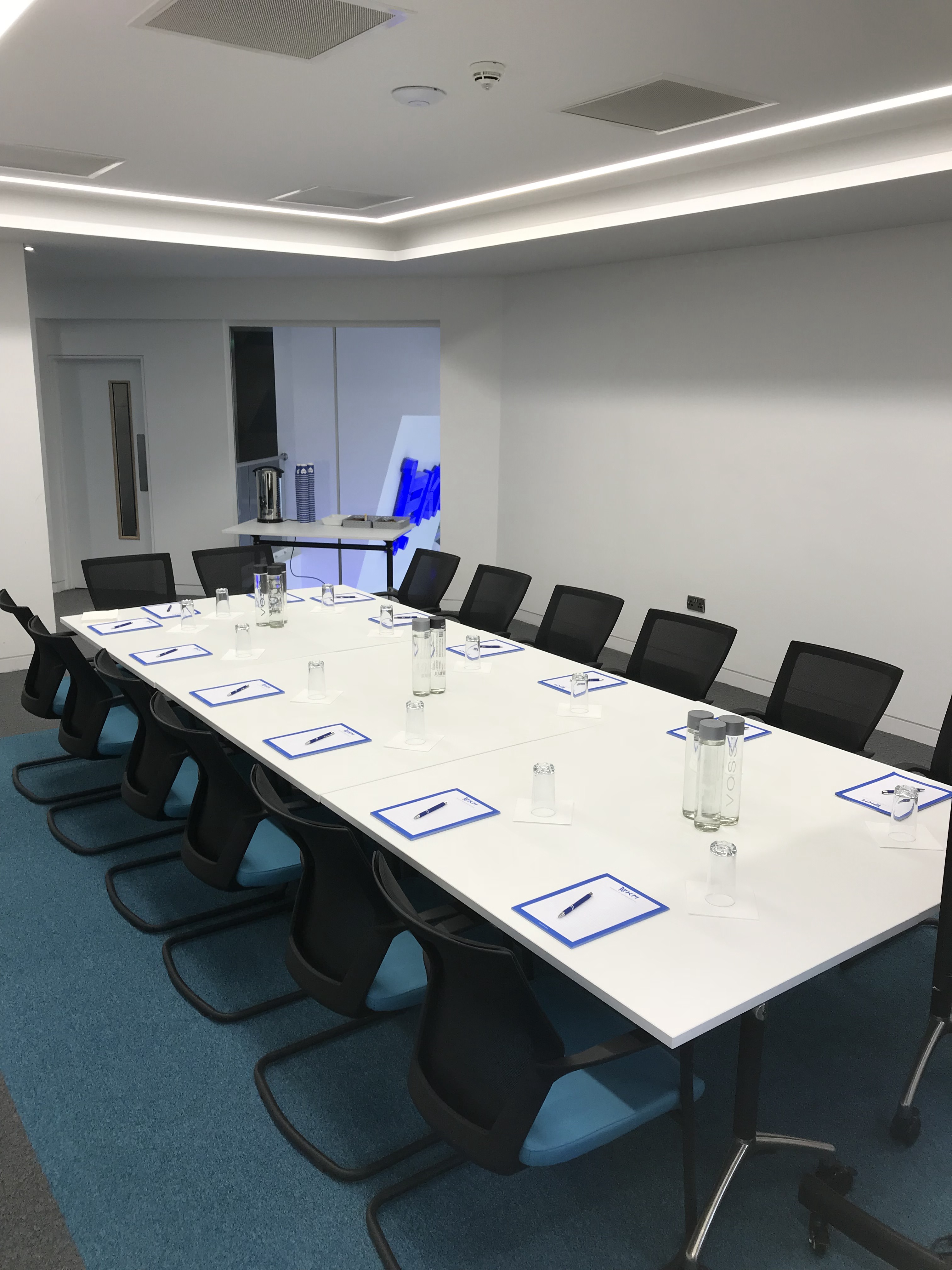 Board Room in EKM, organized meeting space for professional gatherings and presentations.
