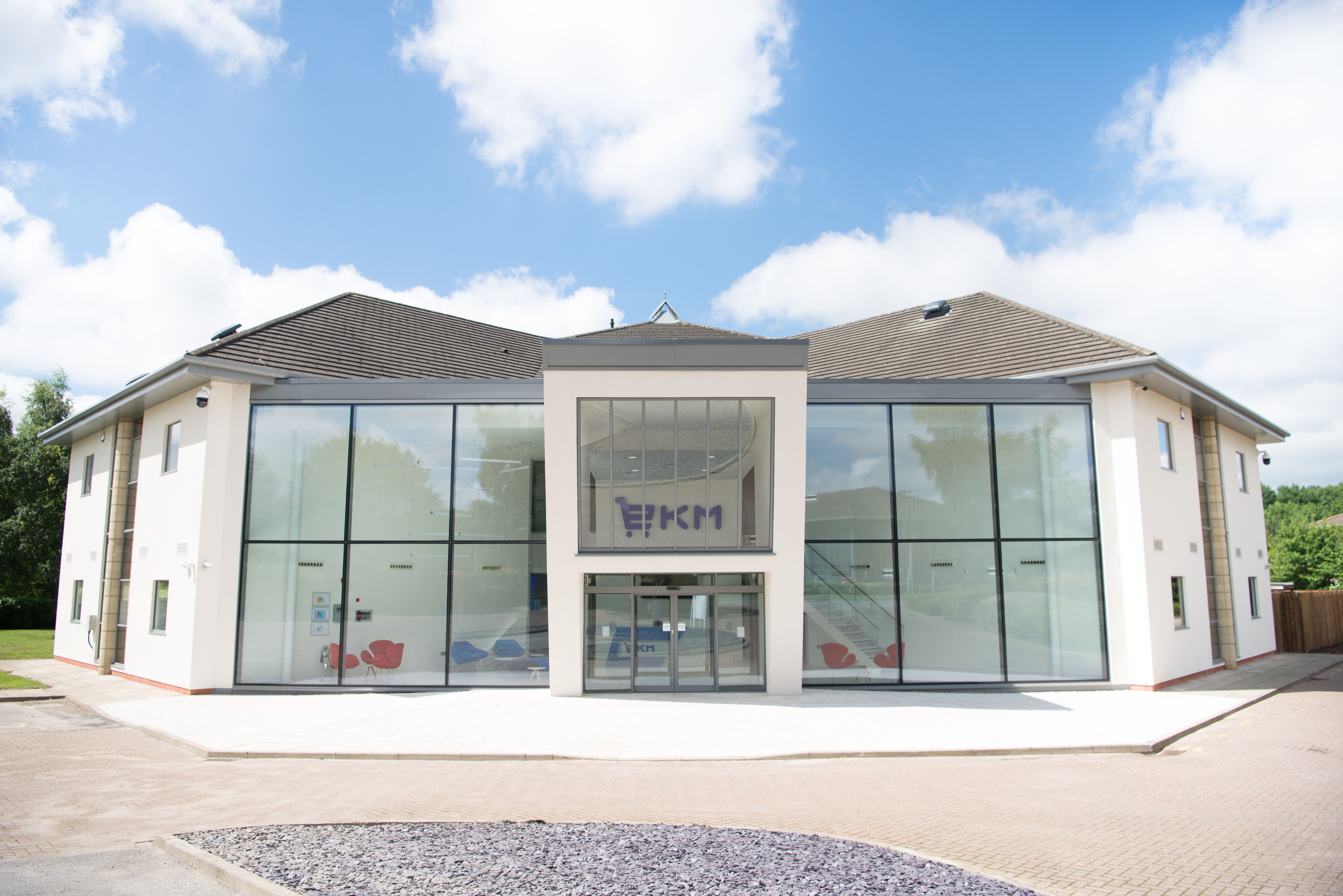 Modern board room with large windows, ideal for meetings and events in EKM.