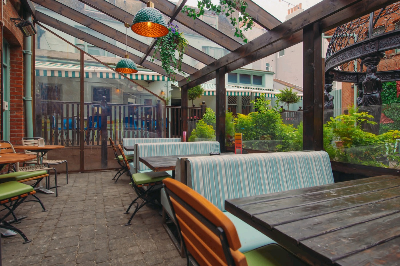Charming outdoor courtyard with glass roof for casual meetings and events in Brighton.