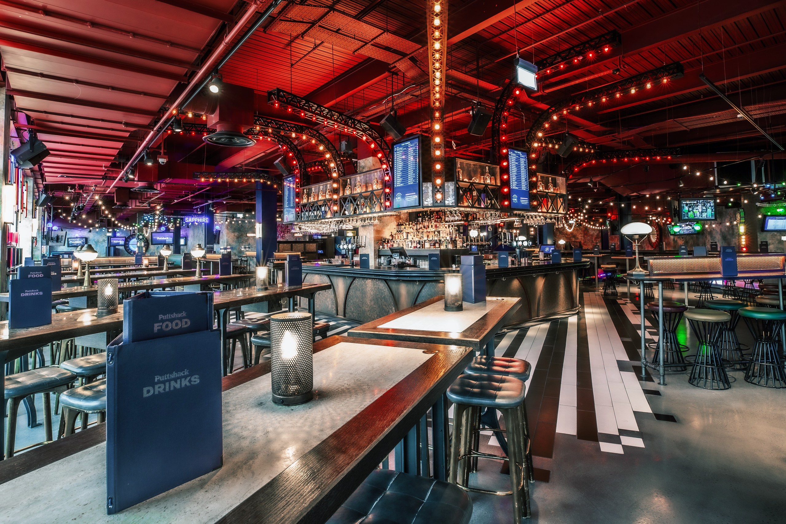 Vibrant event space at Puttshack White City, perfect for networking and gatherings.