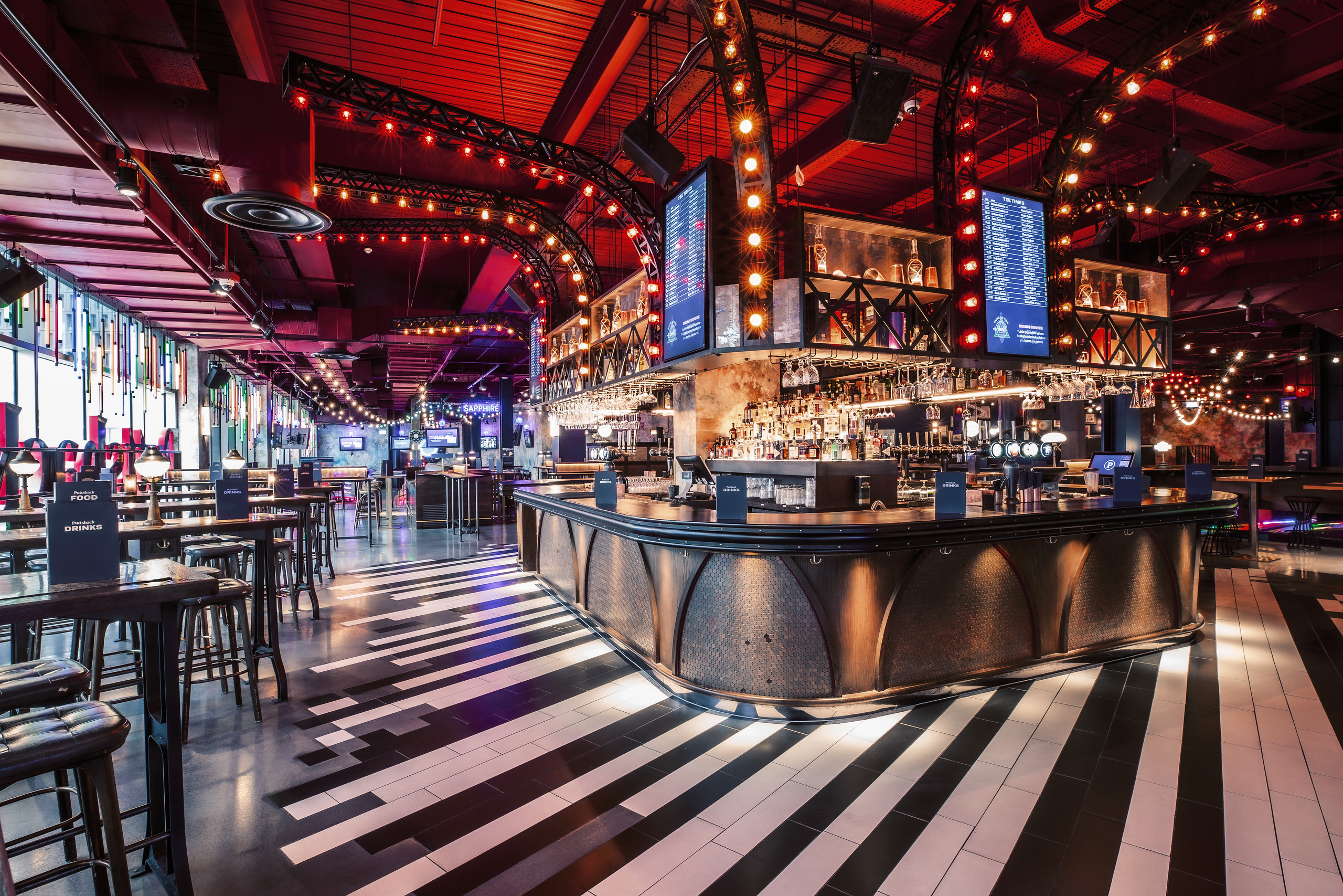 Vibrant event space at Puttshack White City, ideal for networking and social gatherings.