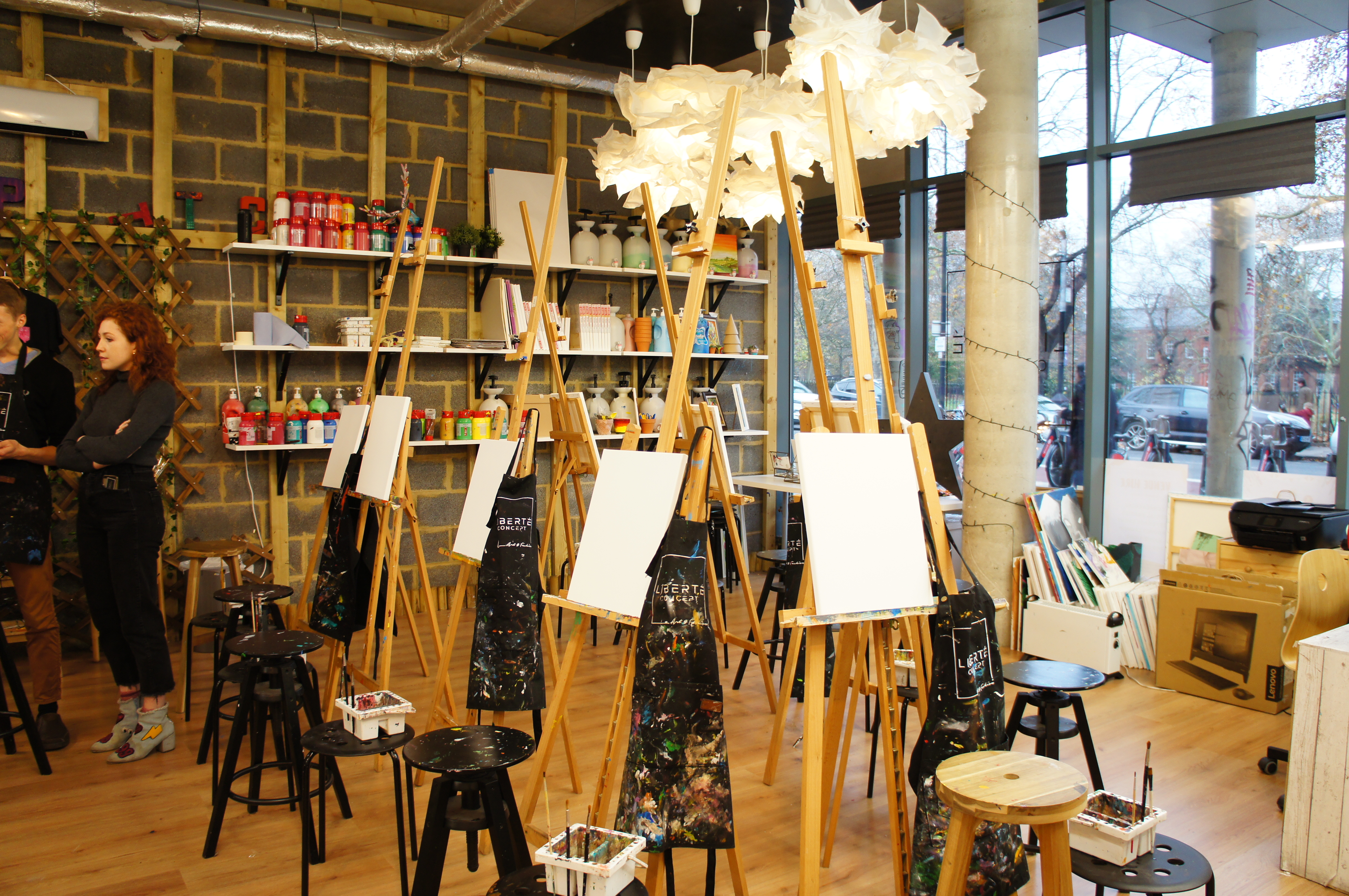 Creative workshop space with easels for art events and team-building activities.