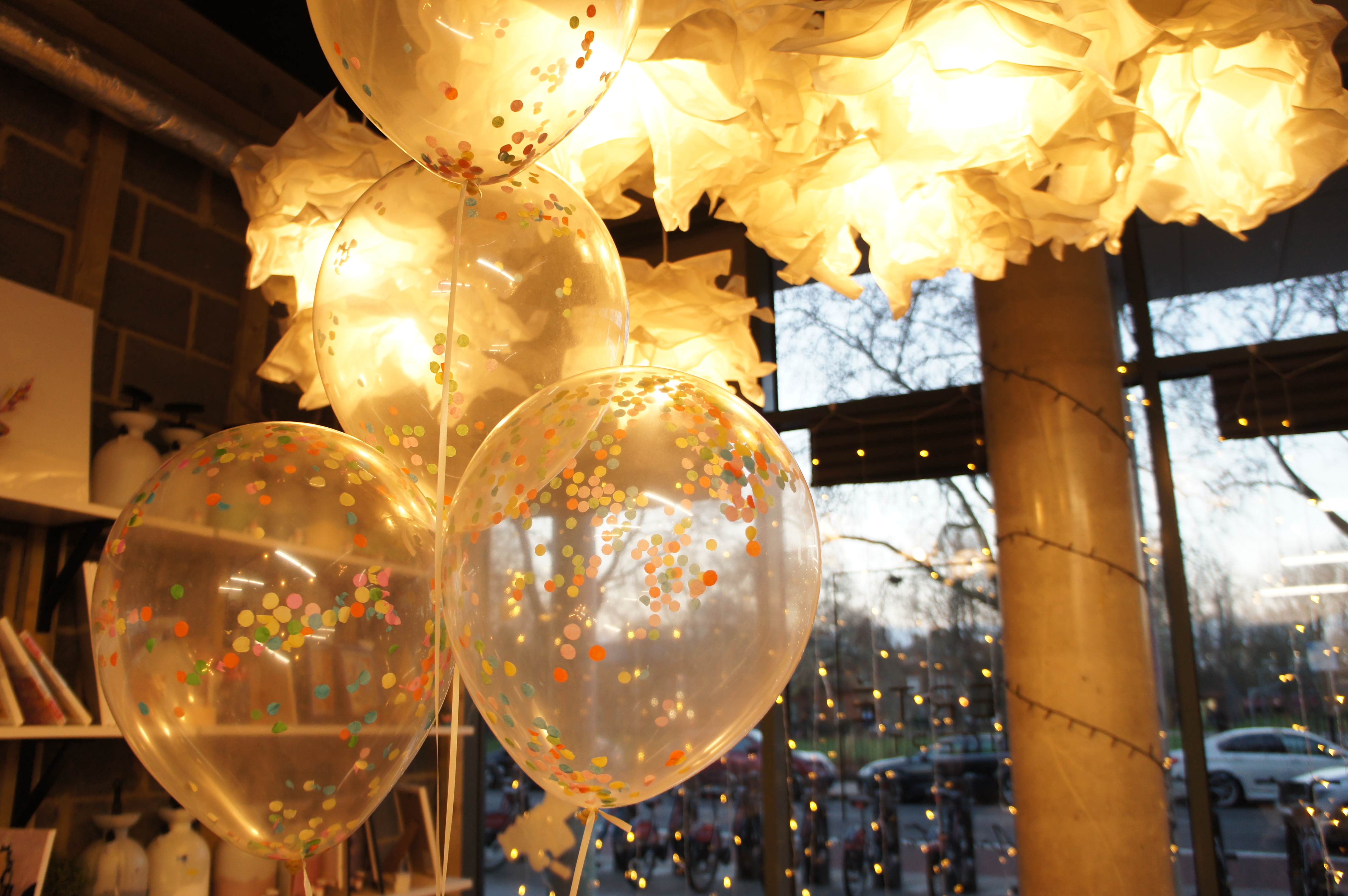 Vibrant event space in Studio 249 with confetti balloons for festive celebrations.