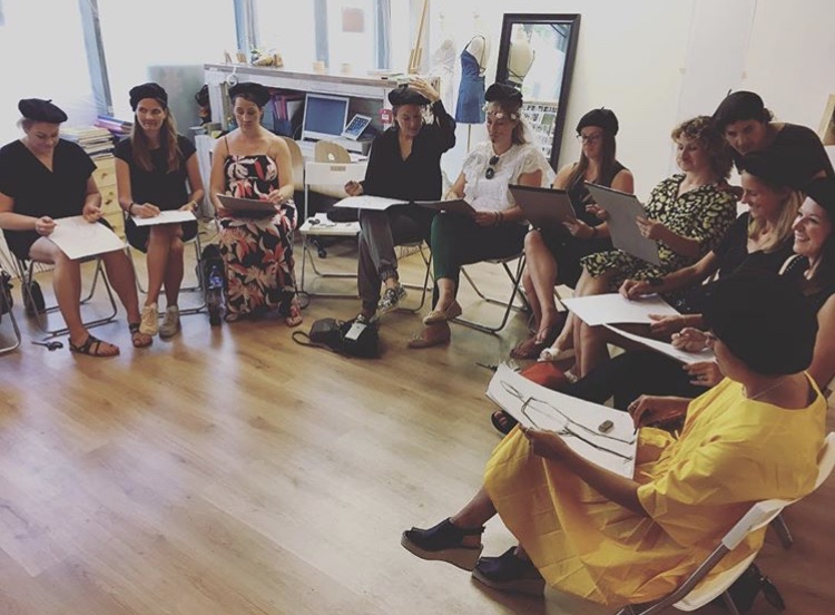 Collaborative workshop in Studio 249, featuring a circular seating arrangement for networking.