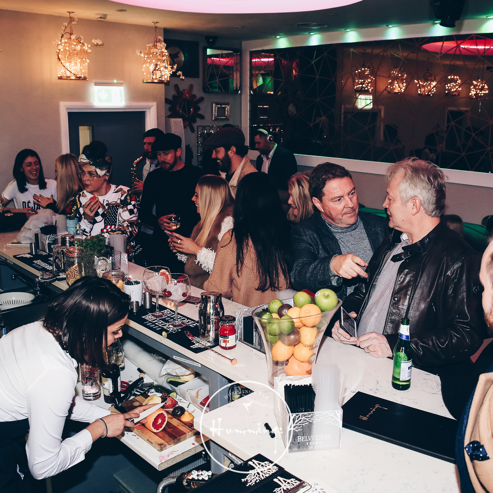 Vibrant bar venue with stylish decor for networking and celebratory events.