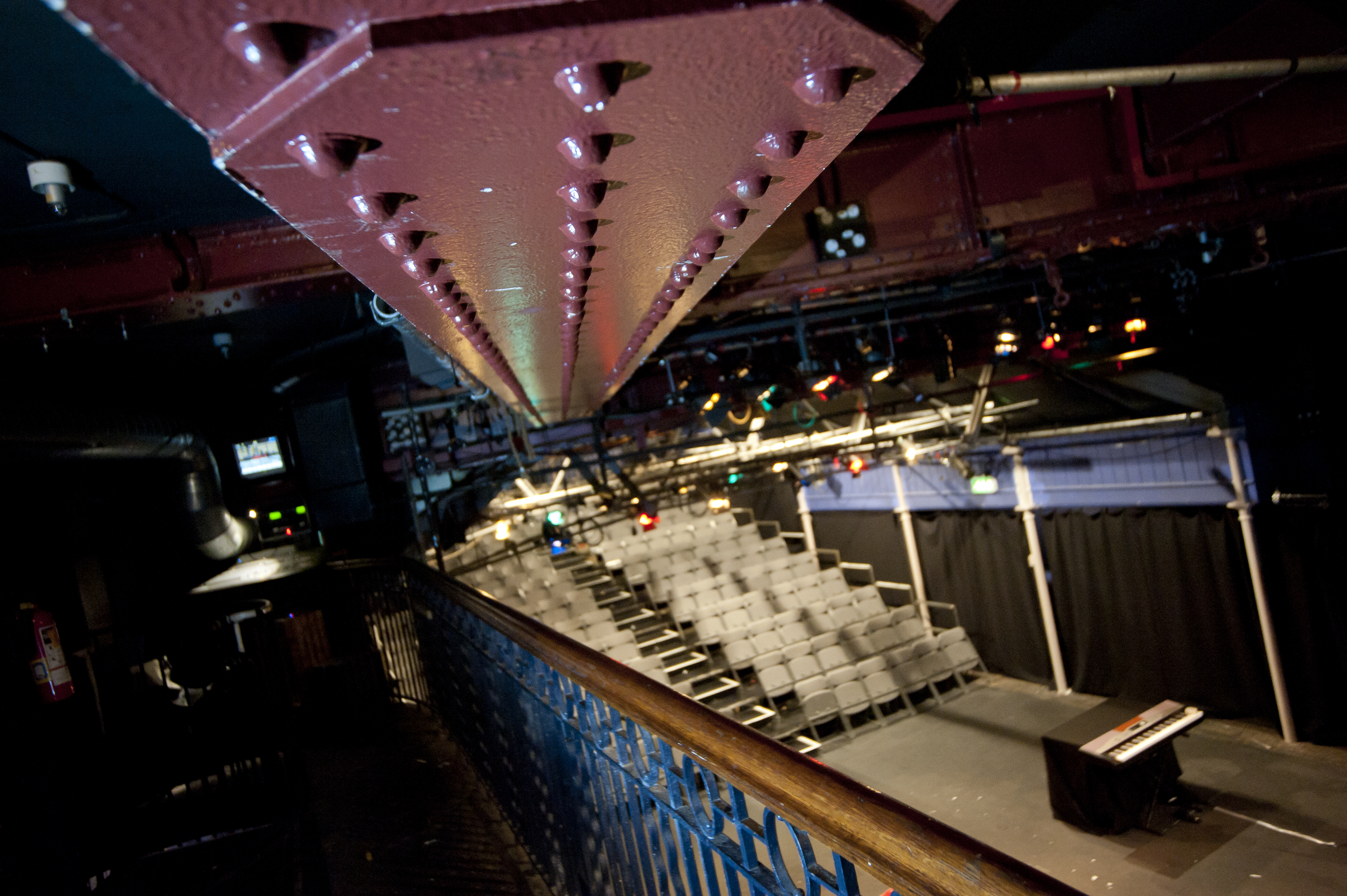 Bridewell Theatre event space with tiered seating, ideal for presentations and performances.