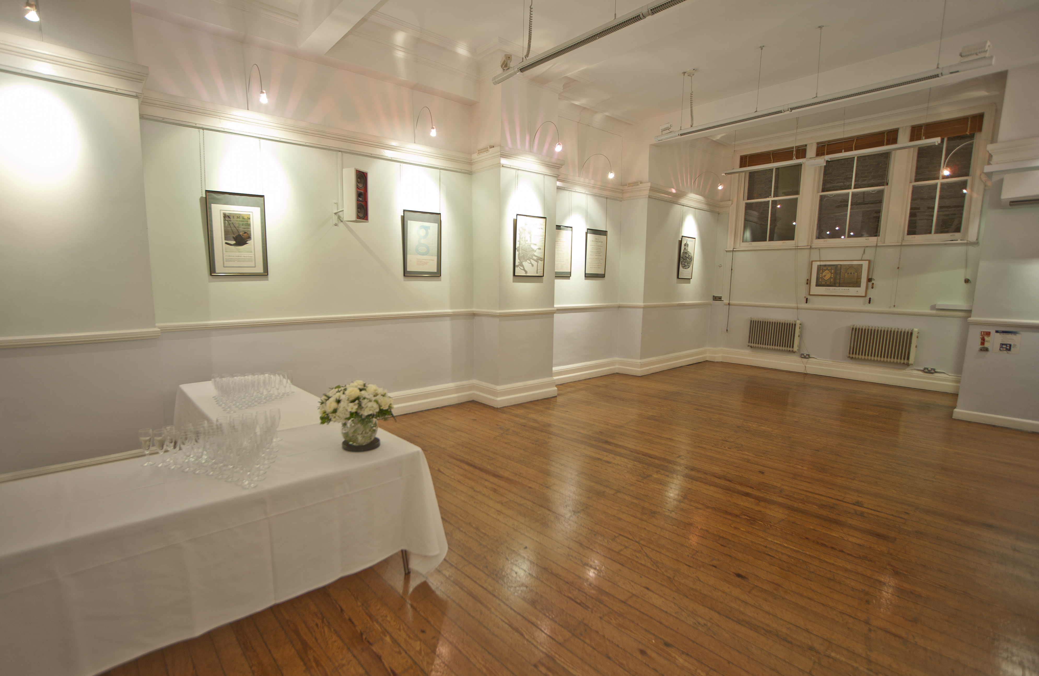 Bridewell Hall event space with polished wooden floors, ideal for gatherings and meetings.