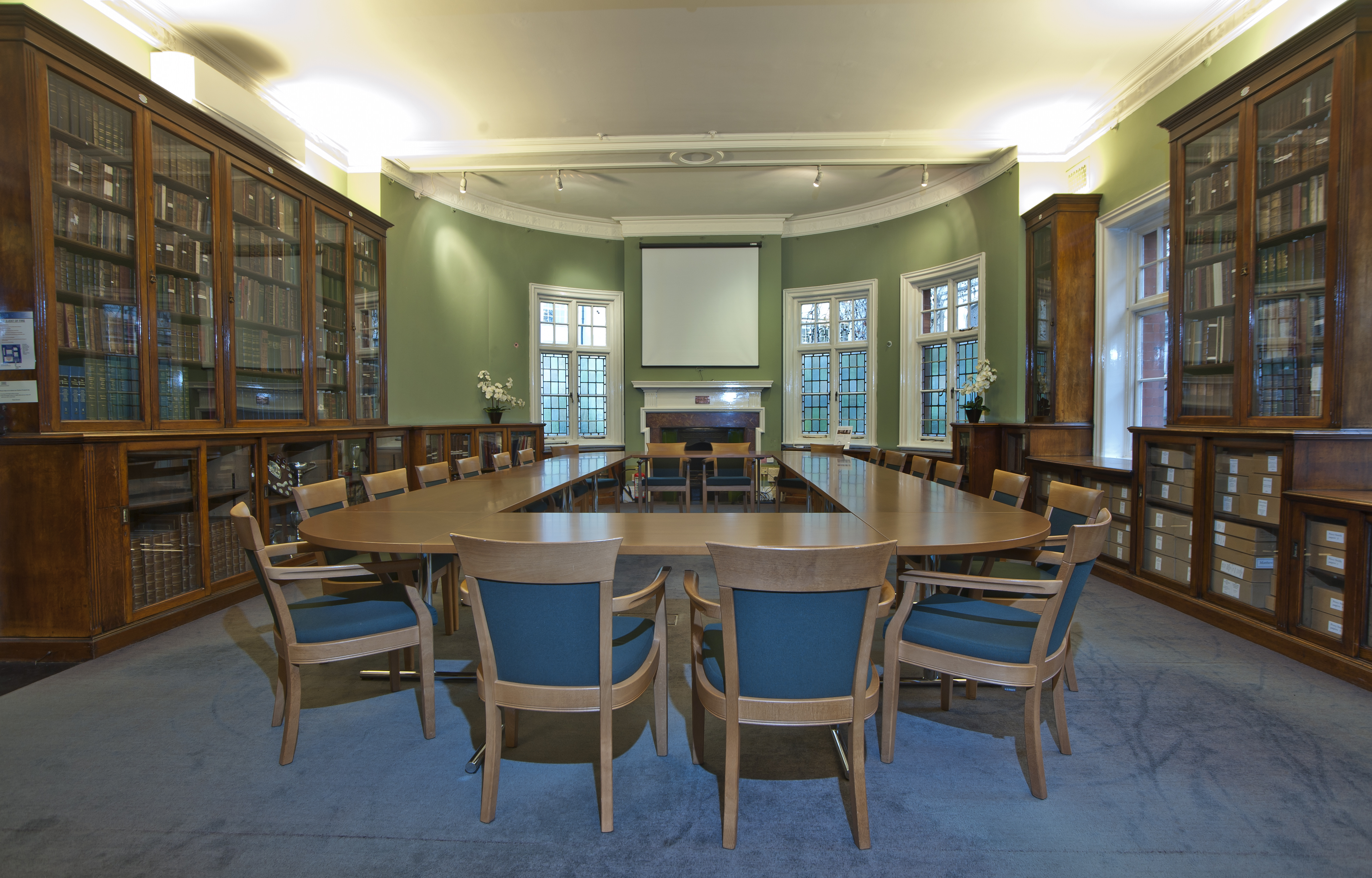 Passmore Edwards Room: oval table meeting space for workshops and strategic discussions.