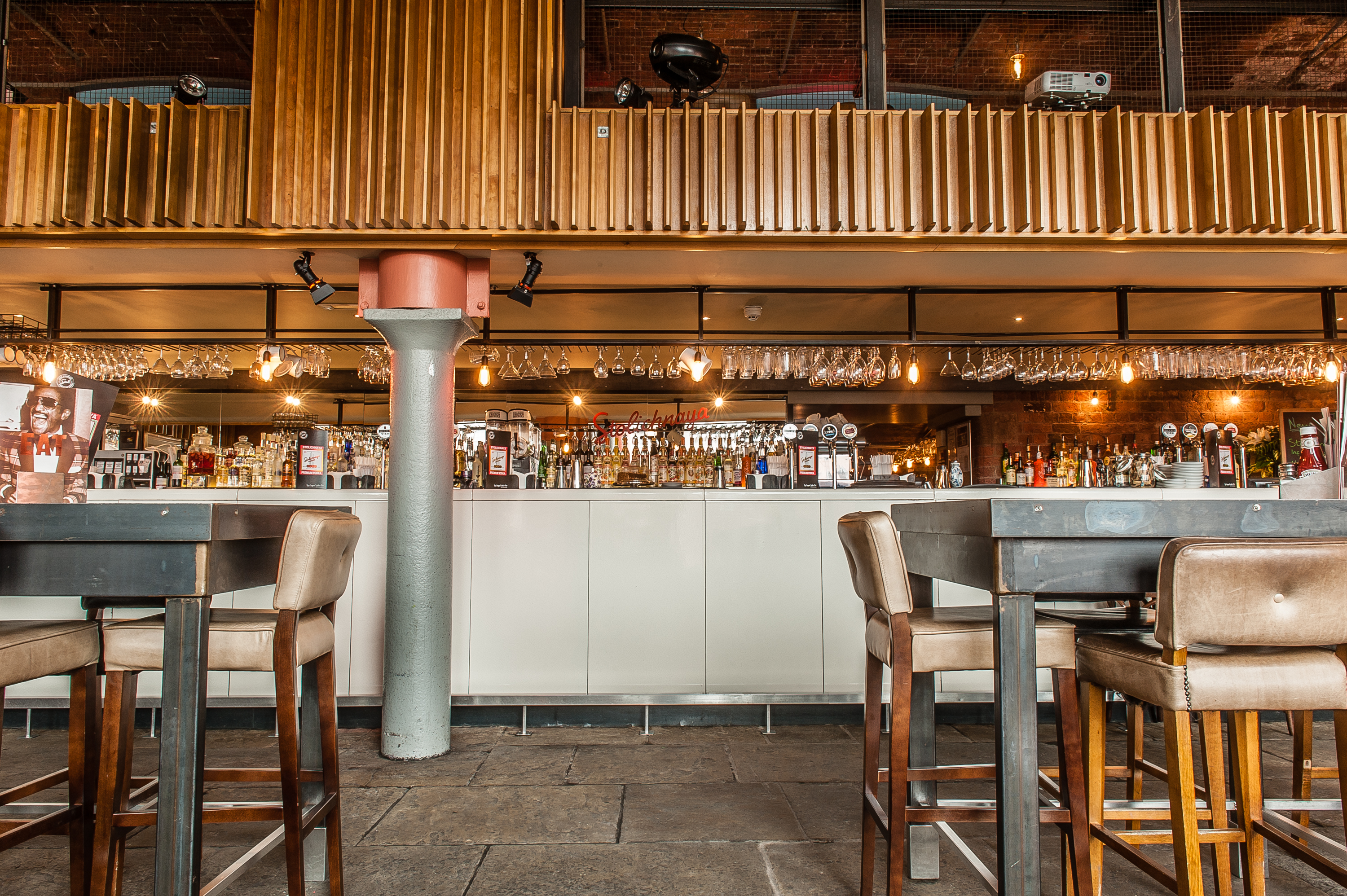 Stylish bar at Dockside, Revolution Albert Dock, perfect for networking events and gatherings.