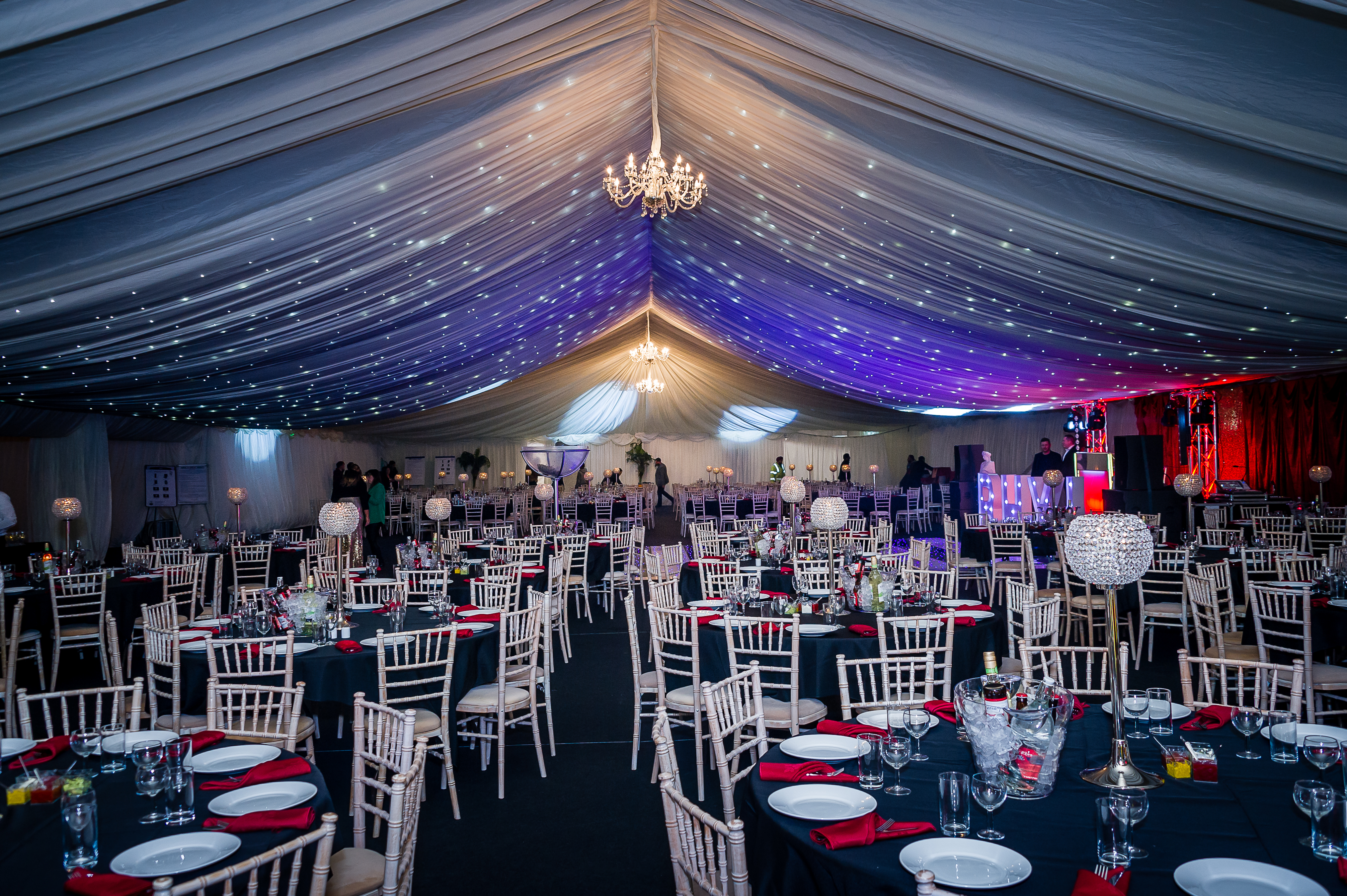 Elegant event space in Hilton Hall with black and white decor, perfect for weddings and corporate events.