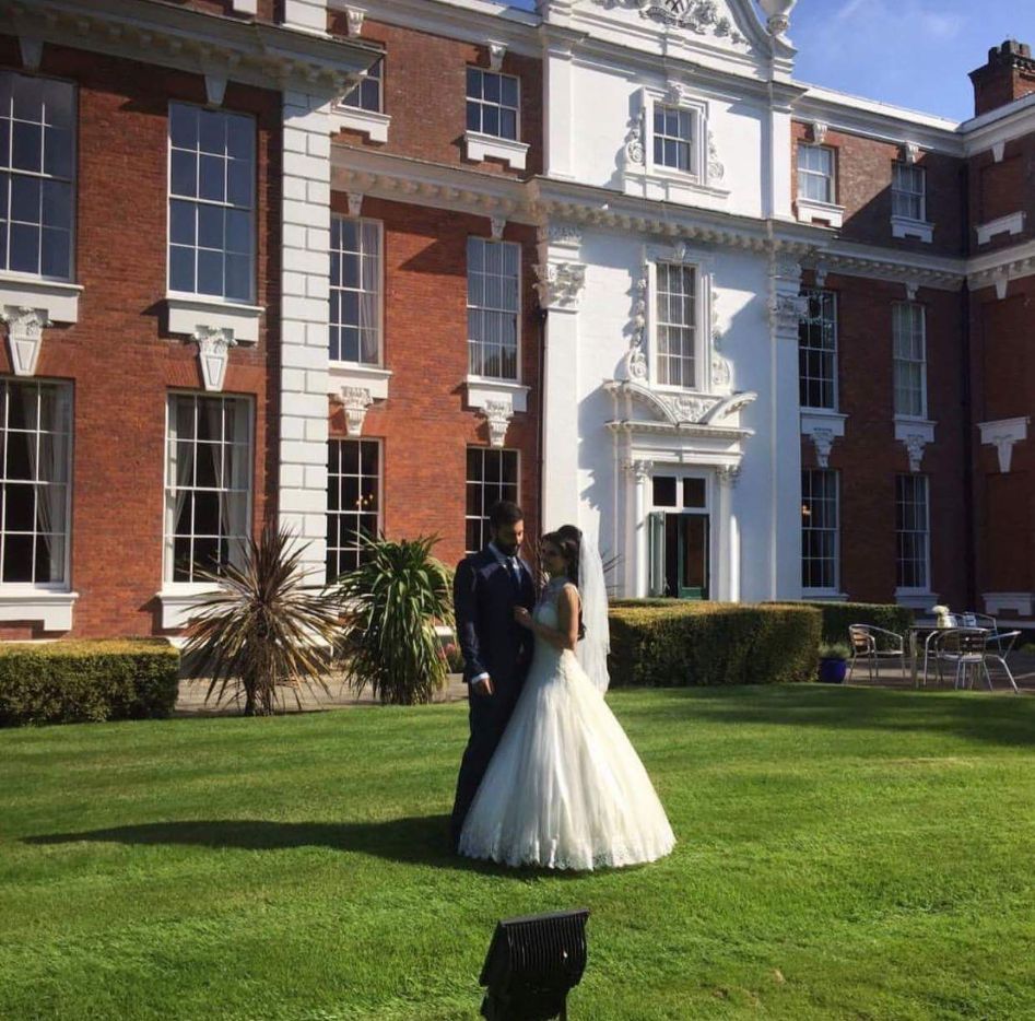 Charming couple at Hilton Hall Marquee, perfect for weddings and outdoor ceremonies.