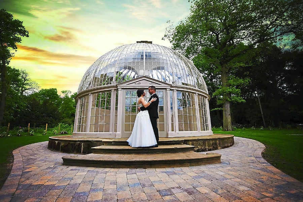 Stunning glass dome venue in Hilton Hall, perfect for romantic weddings and events.