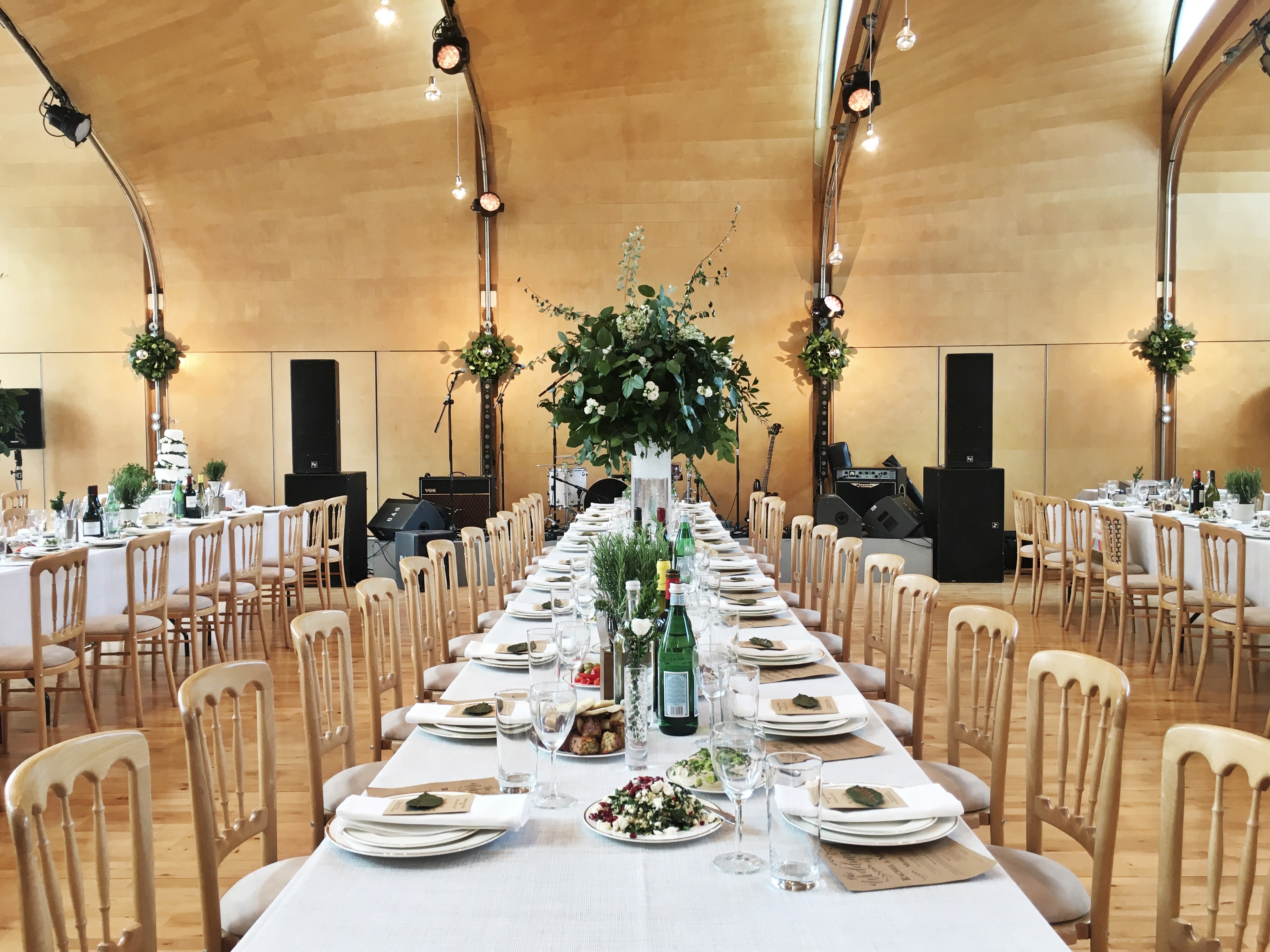 Elegant banquet setup with floral centerpieces at Siobhan Davies Studios for upscale events.