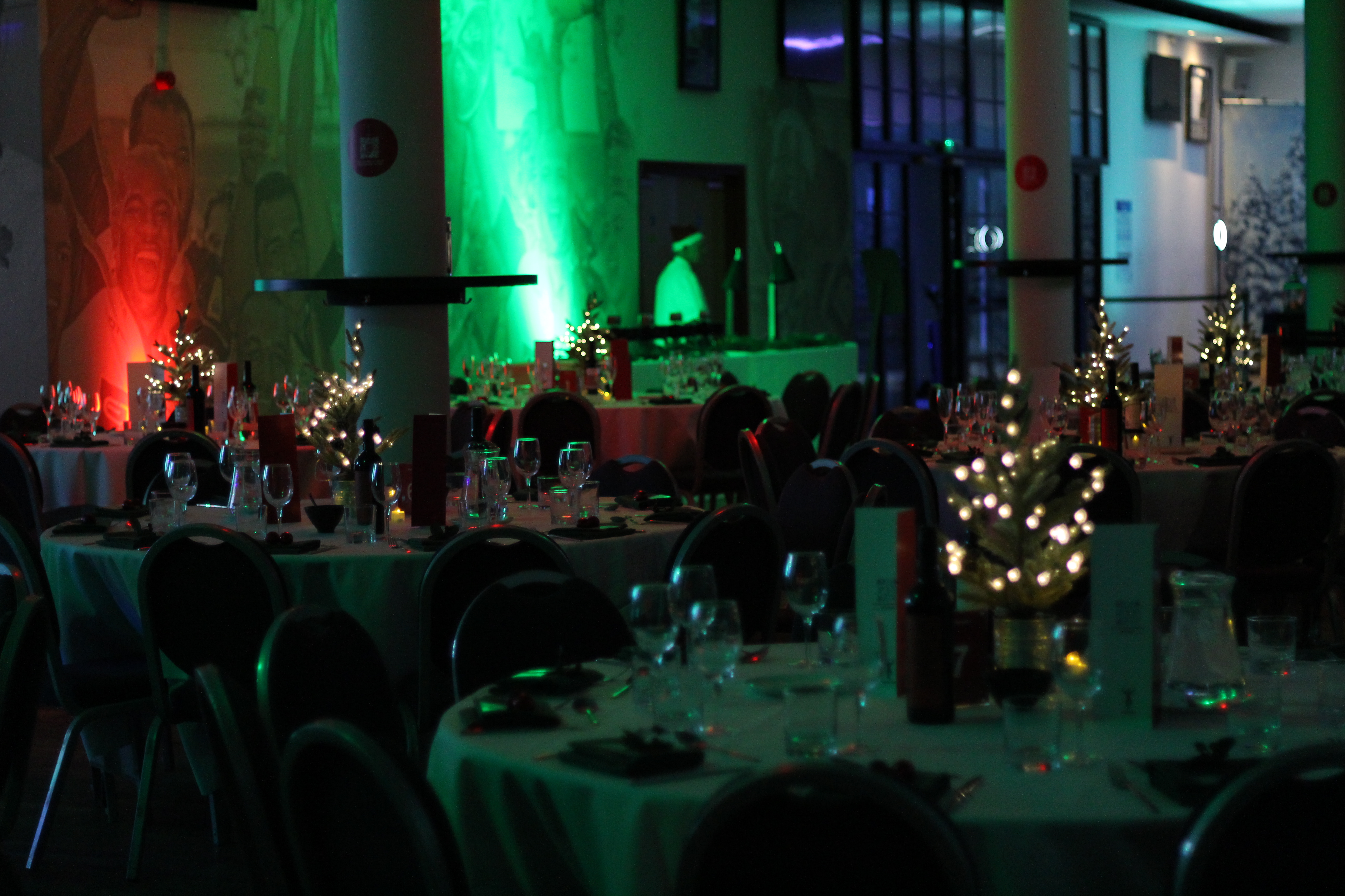 Elegant banquet hall at Twickenham Stoop, festive lighting for holiday events.