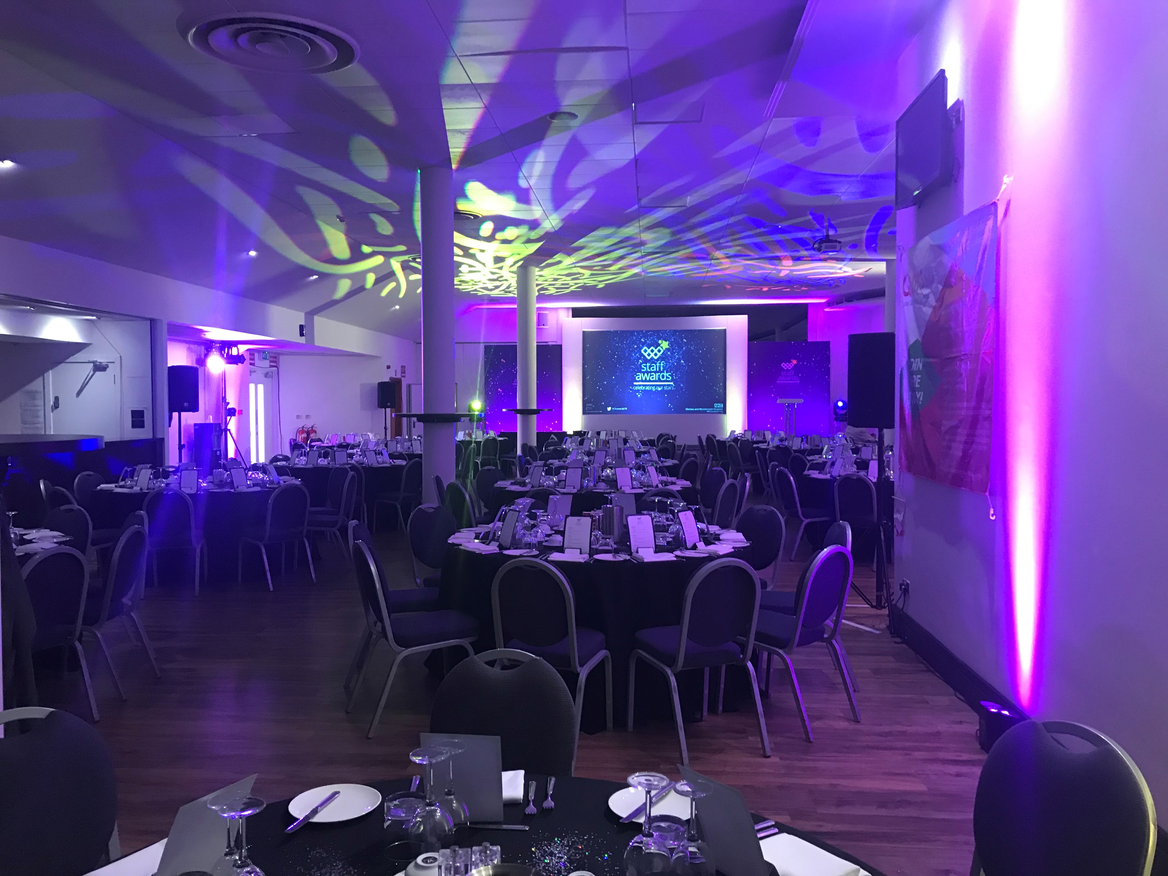 Elegant event space in Twickenham Stoop with round tables, ideal for formal dinners.