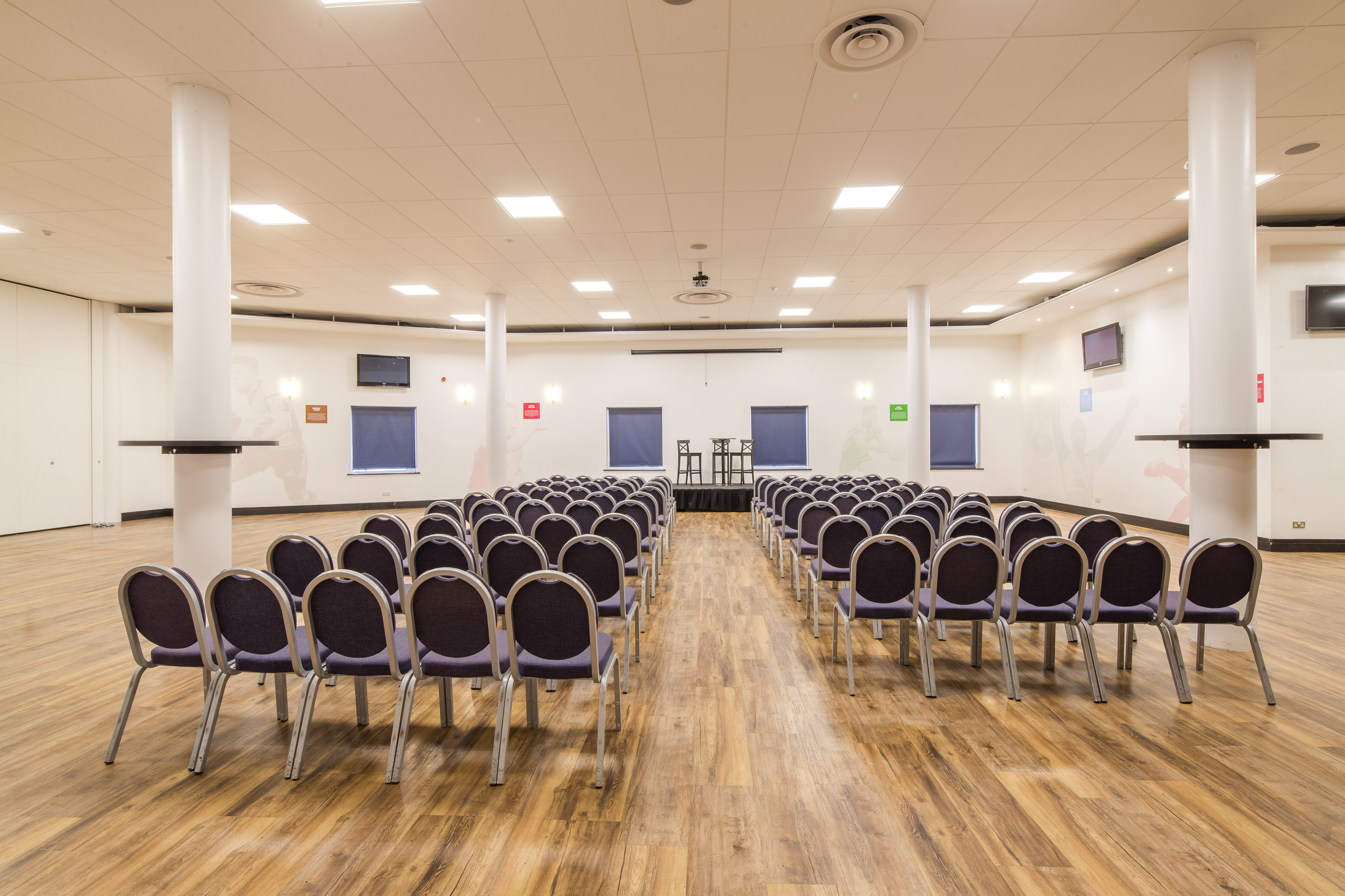 Spacious Twickenham Stoop Undercroft venue set for corporate seminar with natural light.