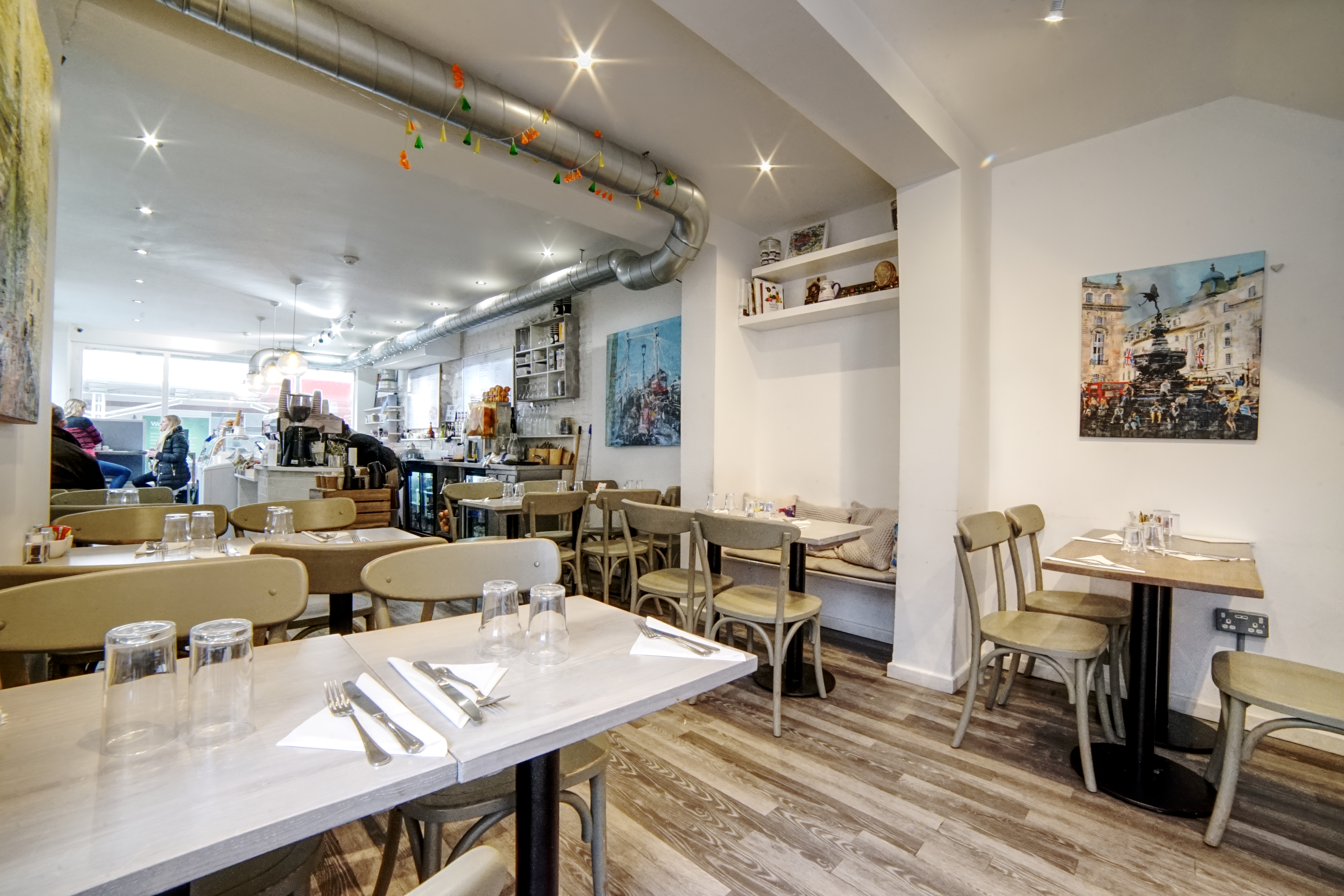 Cozy Chelsea Creperie venue with inviting decor for informal meetings and small events.