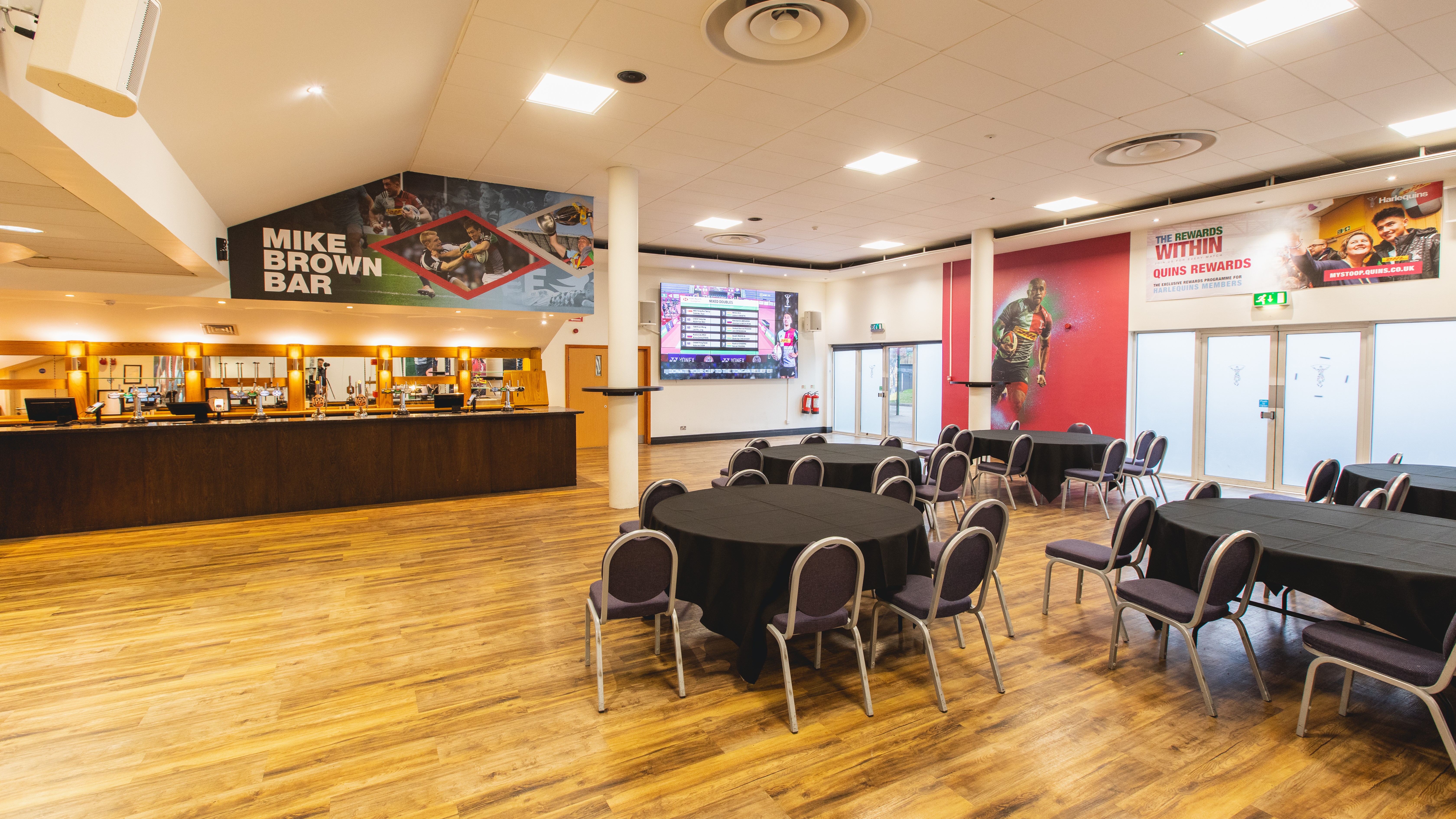 Versatile event space at Twickenham Stoop Stadium with modern decor and flexible seating.