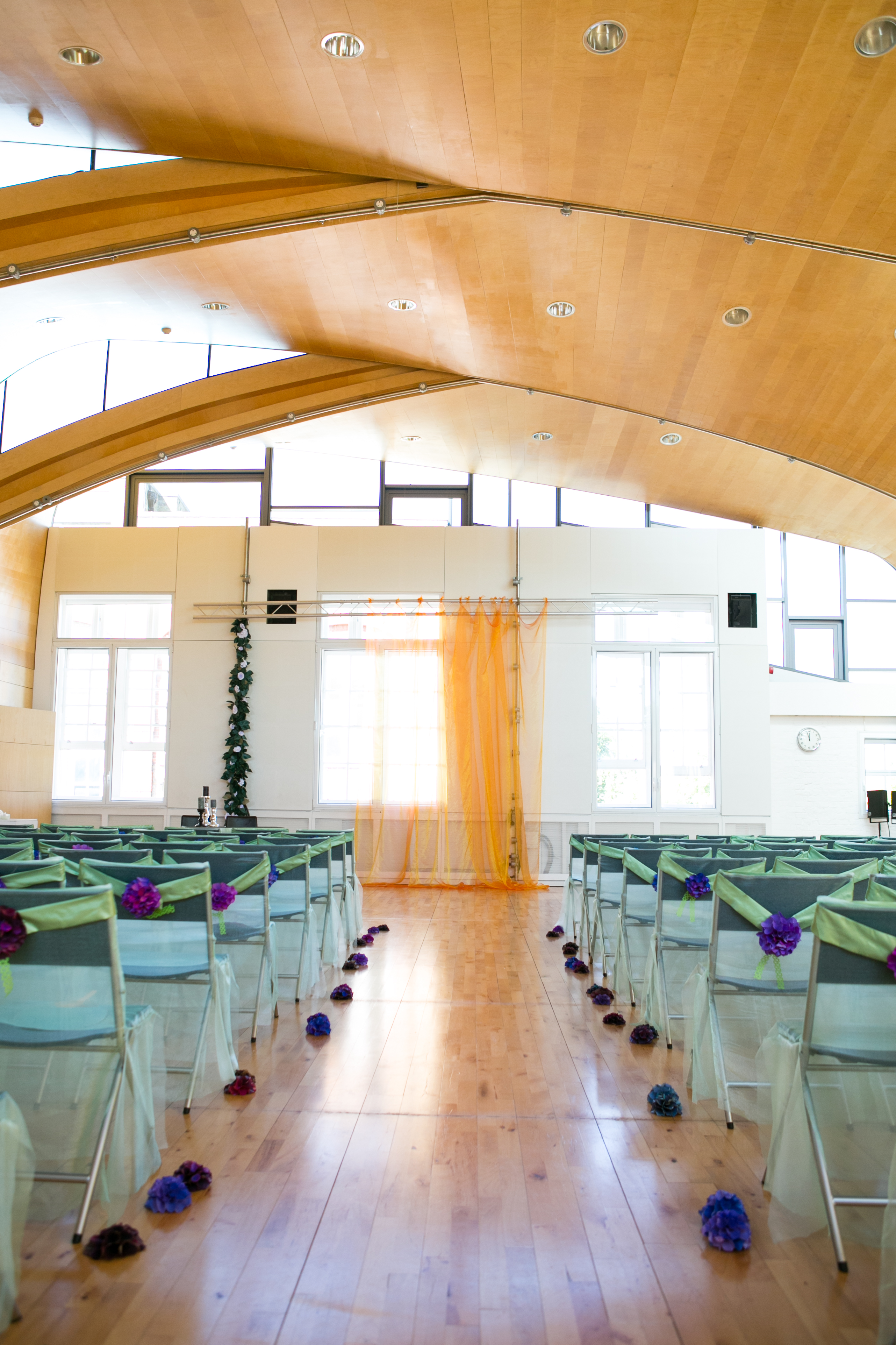 Wedding venue with wooden architecture and vibrant purple accents at Siobhan Davies Studios.