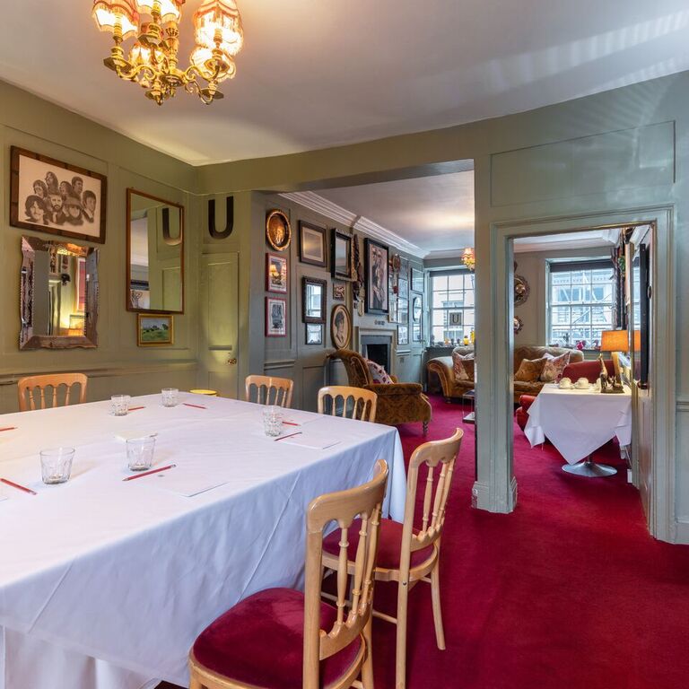 Cozy meeting room at The Union Club, perfect for gatherings and brainstorming sessions.