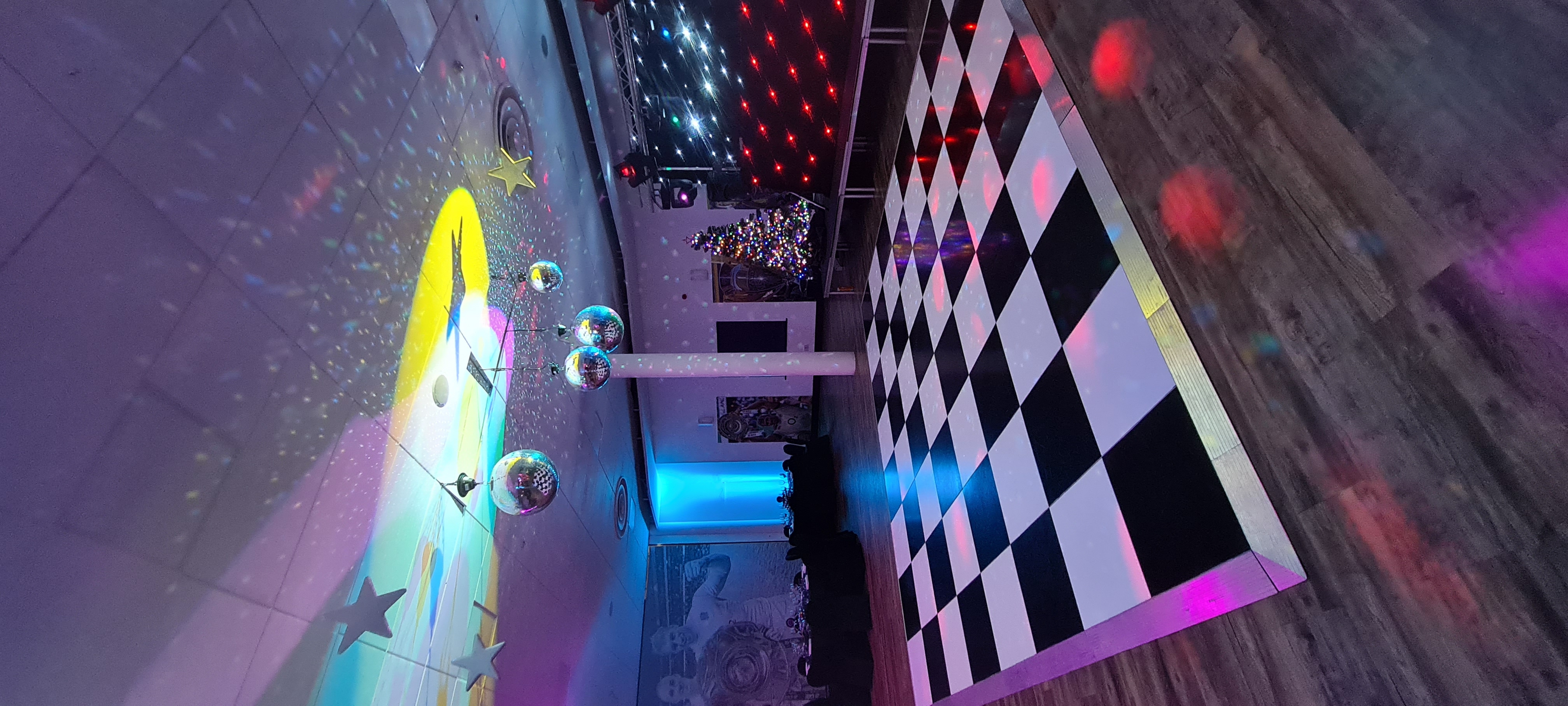 Chris Robshaw Bar with checkered dance floor, perfect for festive gatherings and events.