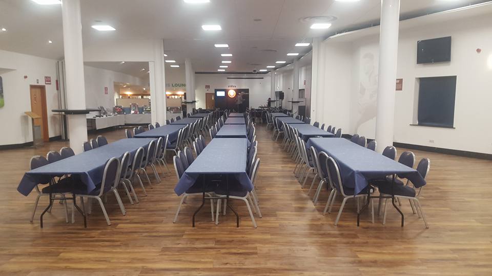 Chris Robshaw at Twickenham Stoop Stadium, blue tablecloths for dining and networking events.