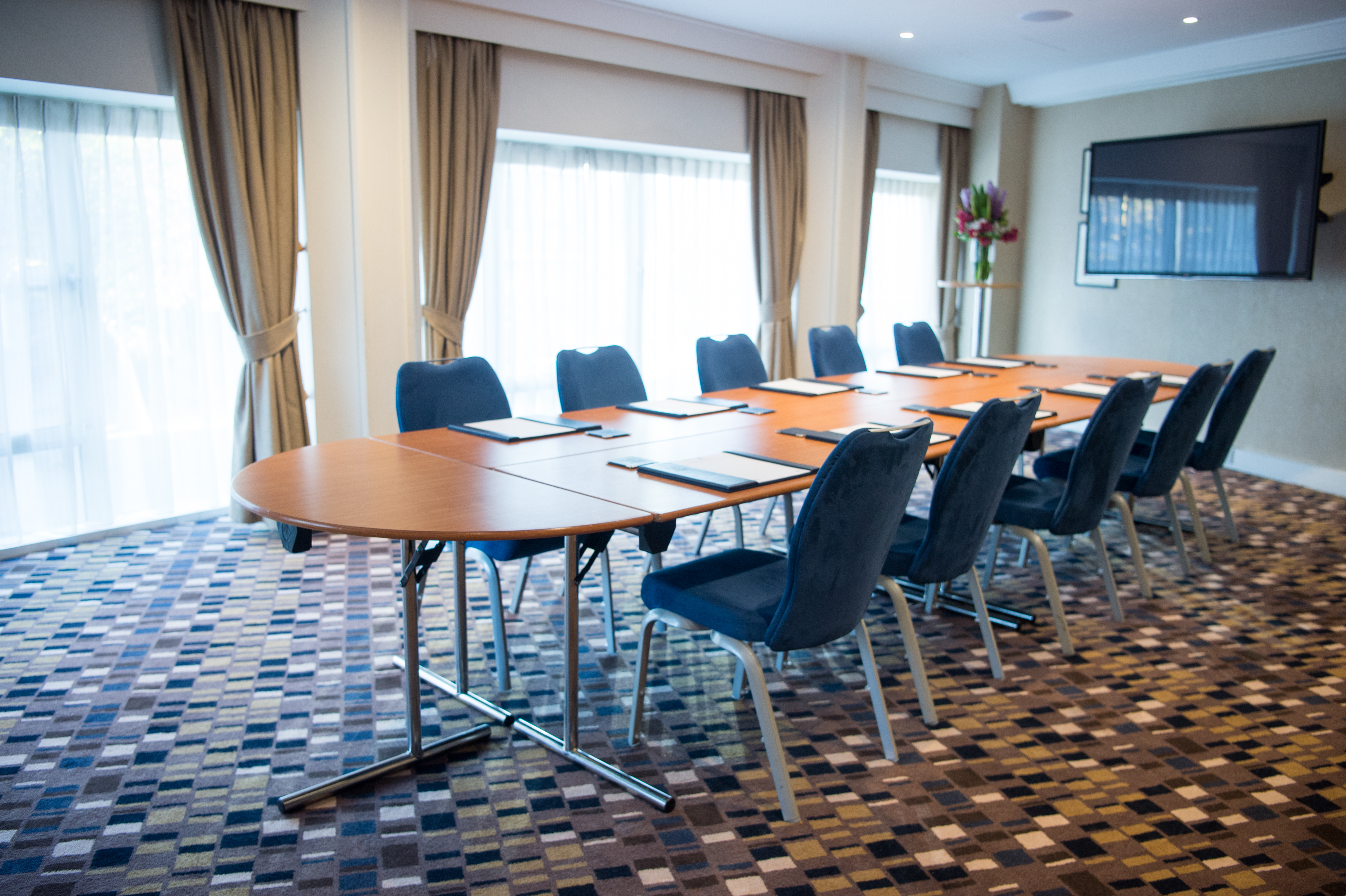 Allenby Room at Victory Services Club, ideal for corporate meetings with natural light.