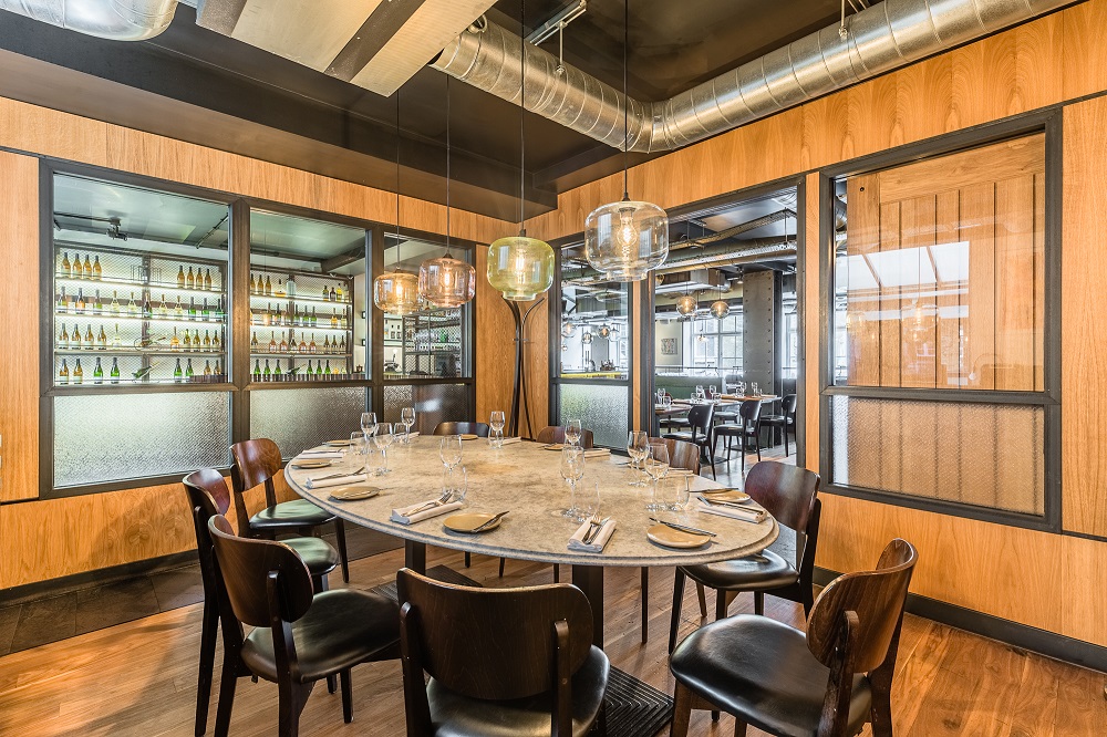 Private dining room with round table at Heddon Street Kitchen for exclusive events.