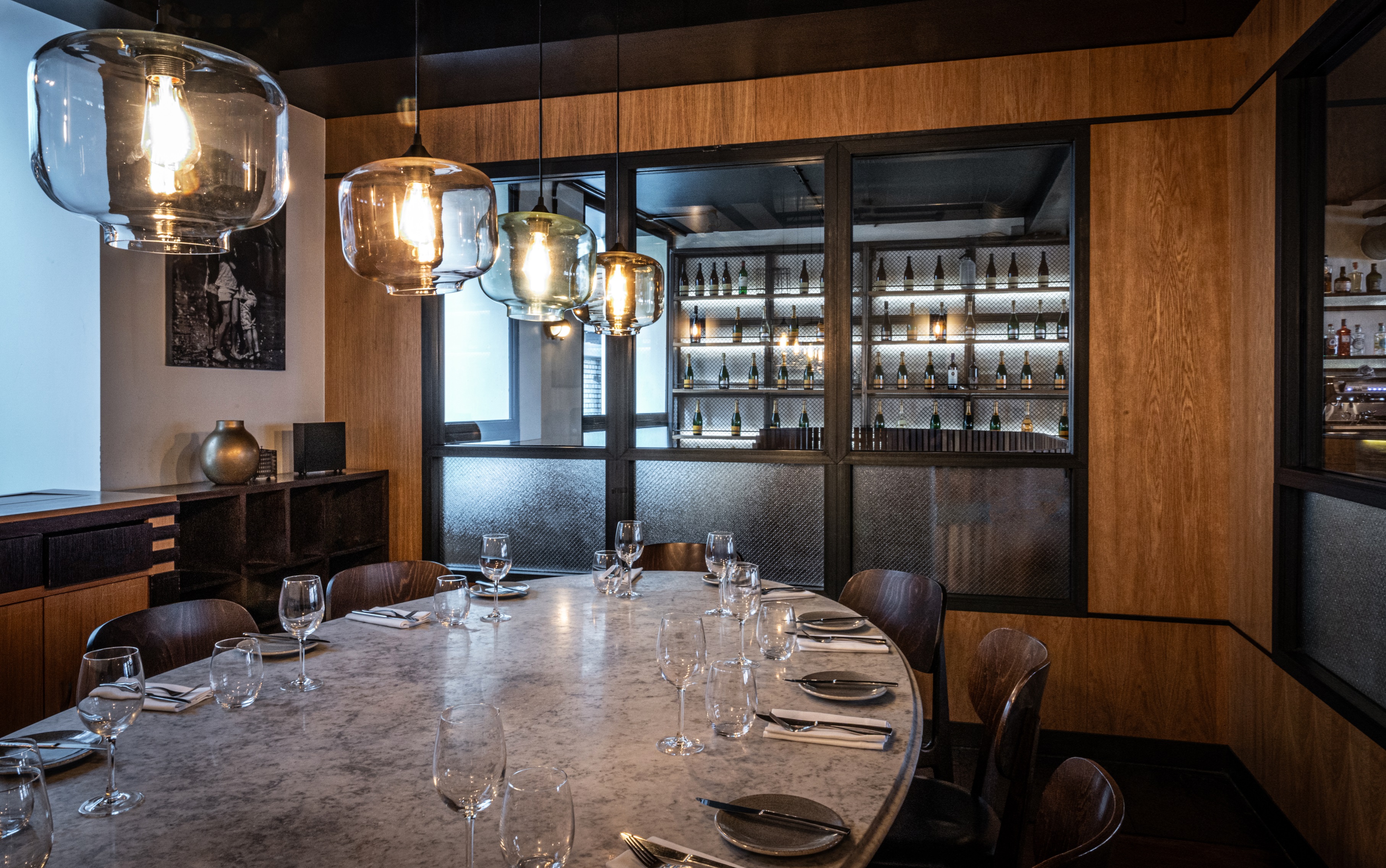 Private dining room with elegant round table for exclusive events at Heddon Street Kitchen.