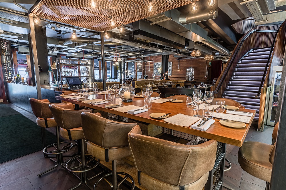 Stylish kitchen table setting in Heddon Street Kitchen for intimate events and networking dinners.
