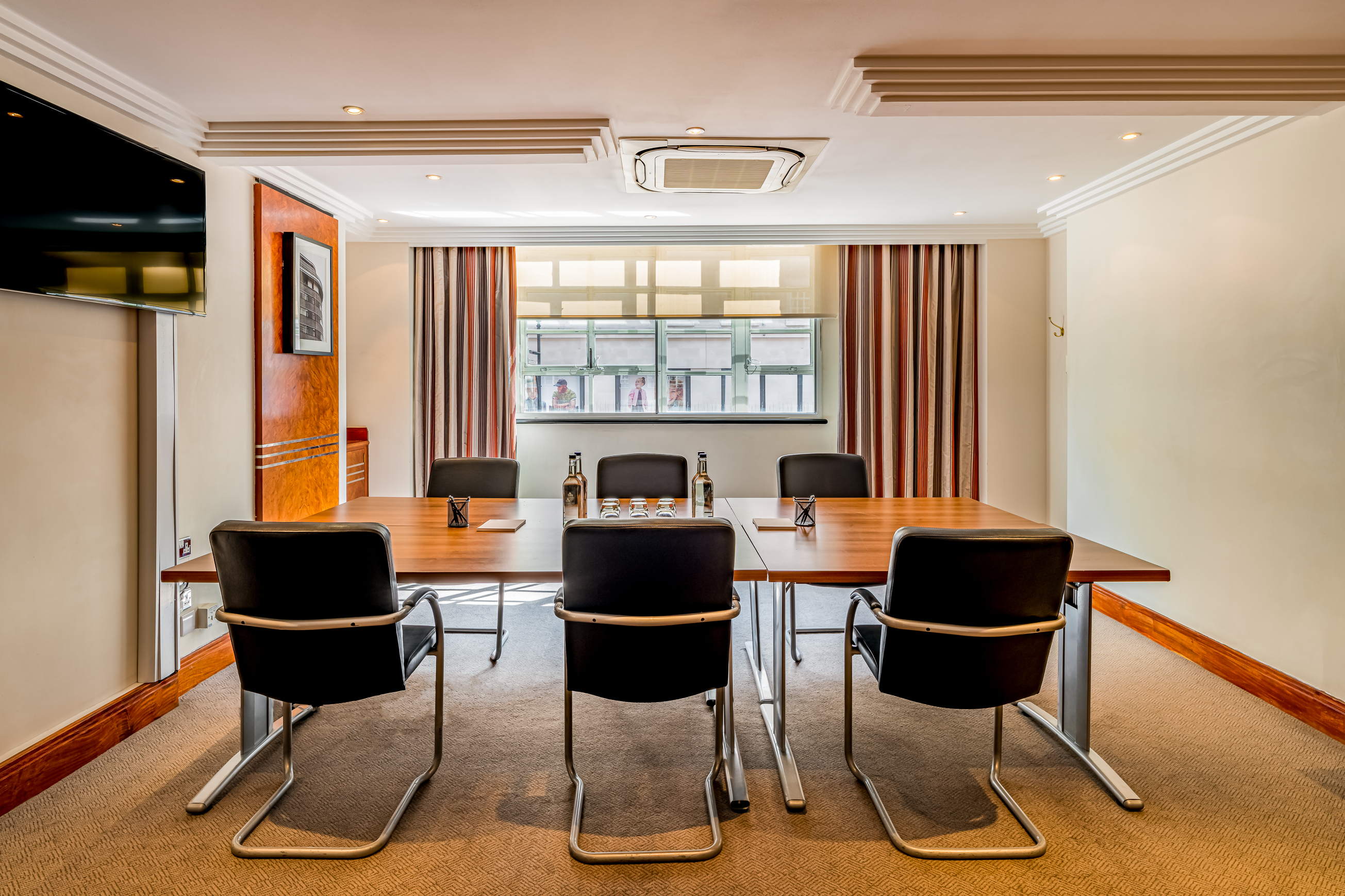 Meeting room at Thistle Marble Arch, featuring a large table for corporate events.