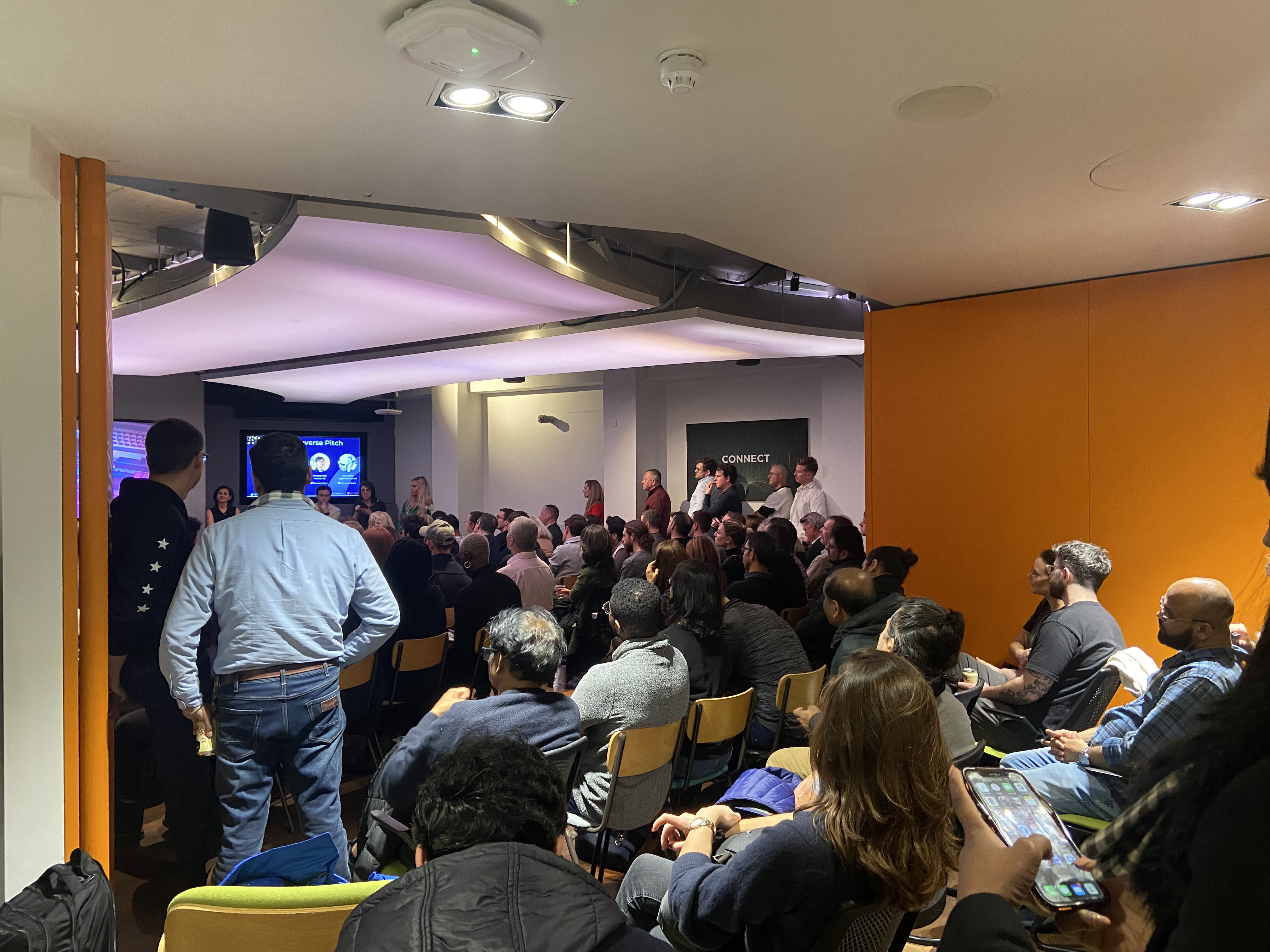 Event Space in IDEALondon with engaged audience at a modern interactive event.