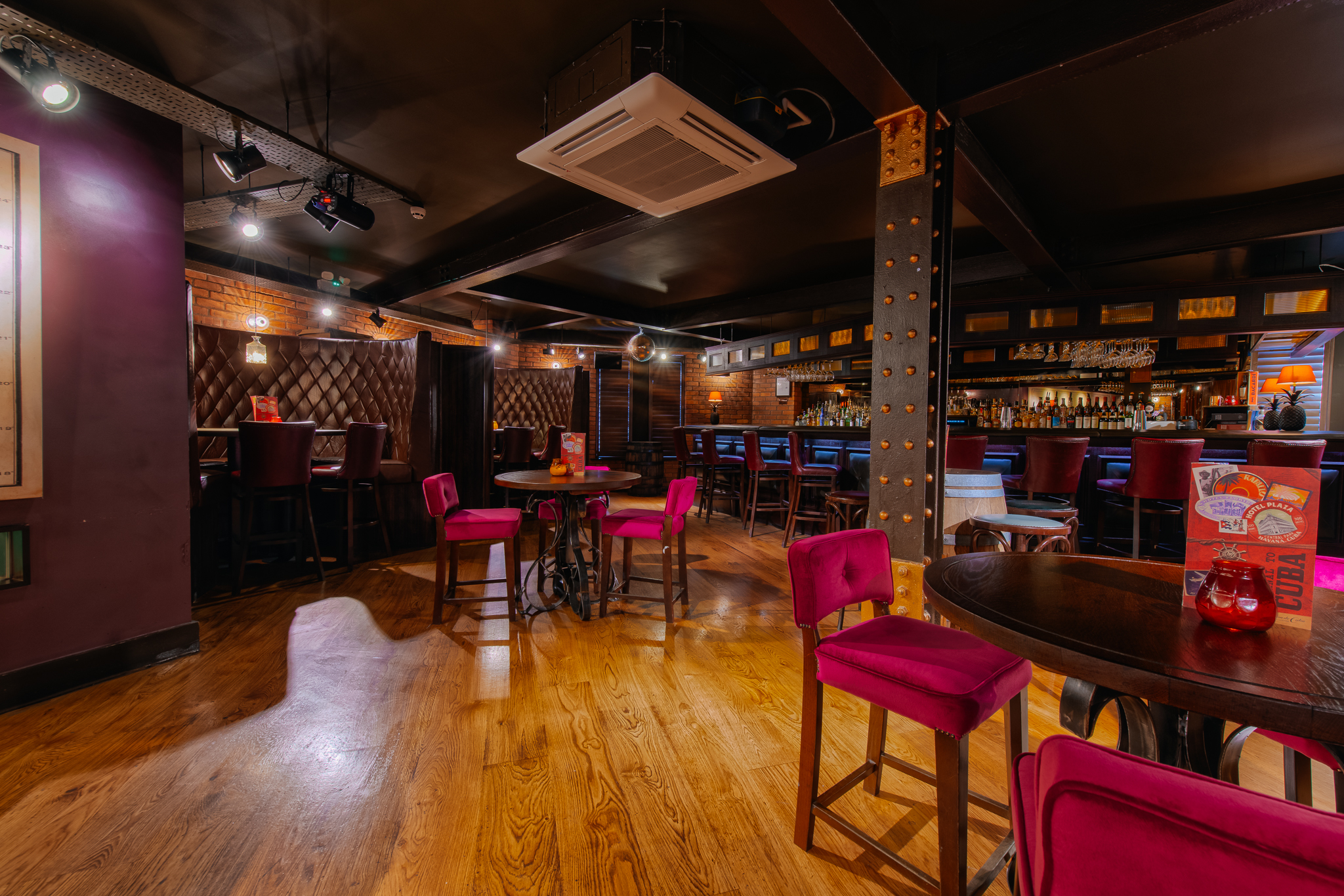 Havana Bar Leeds: modern event space with pink seating, perfect for networking and gatherings.