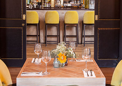 Stylish dining setup at Smith Bar, ideal for intimate meetings and events in Trafalgar Arms.