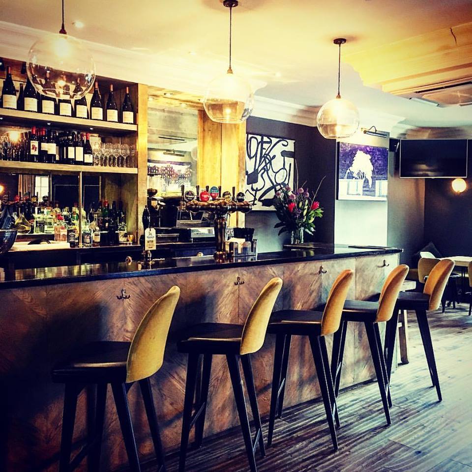 Stylish bar and seating at Smith Bar, ideal for cocktail receptions and networking events.