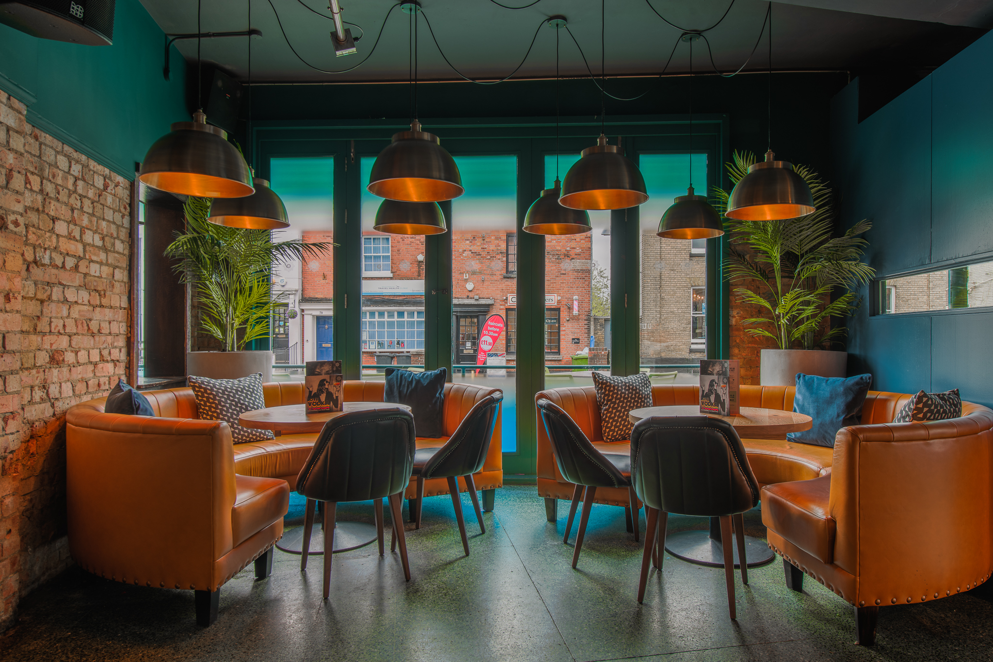 Stylish meeting space with cozy seating for networking events at Revolution Southampton.