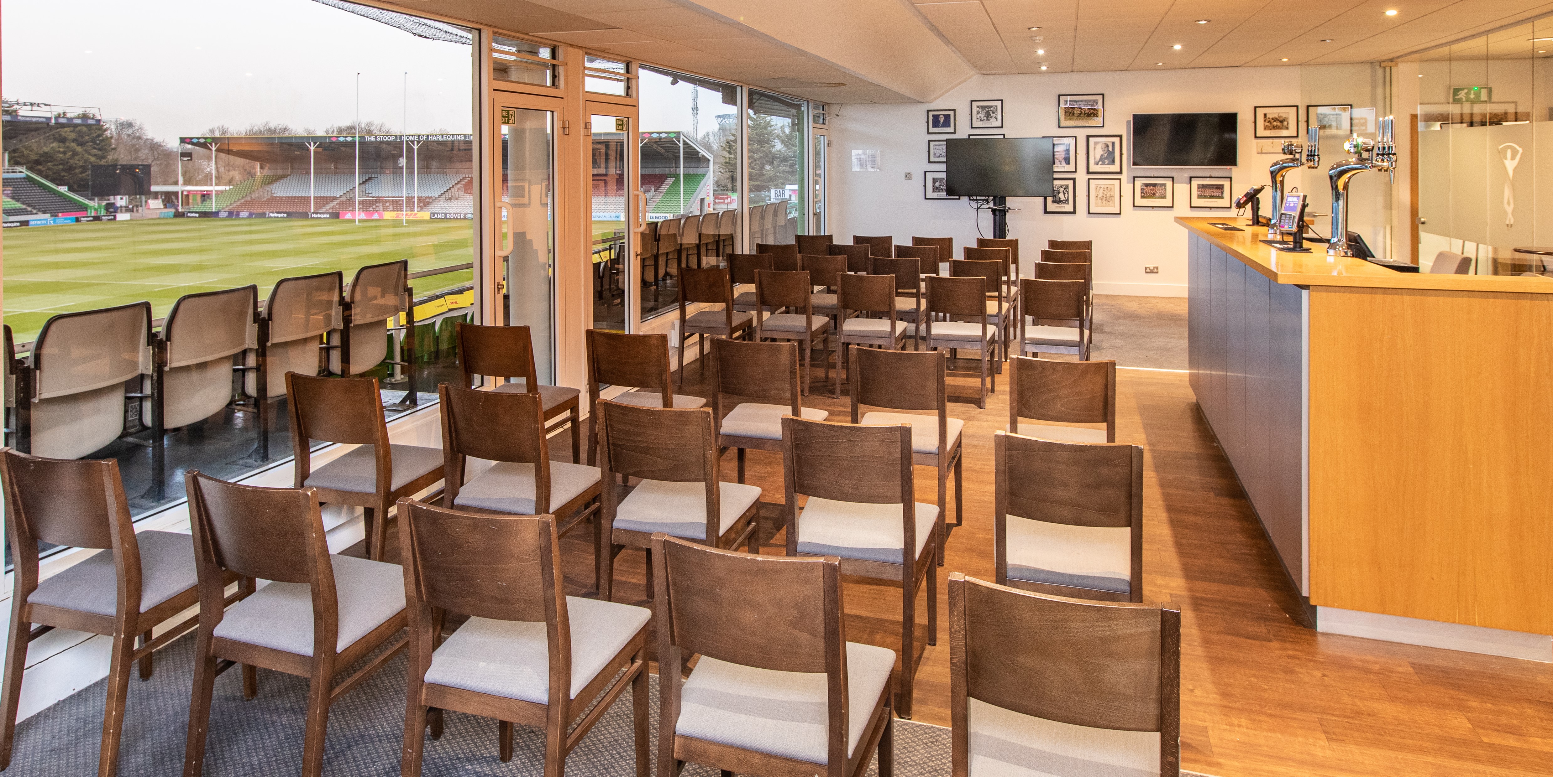 Trustees Lounge at Twickenham Stoop, set for a meeting with natural light and tech amenities.