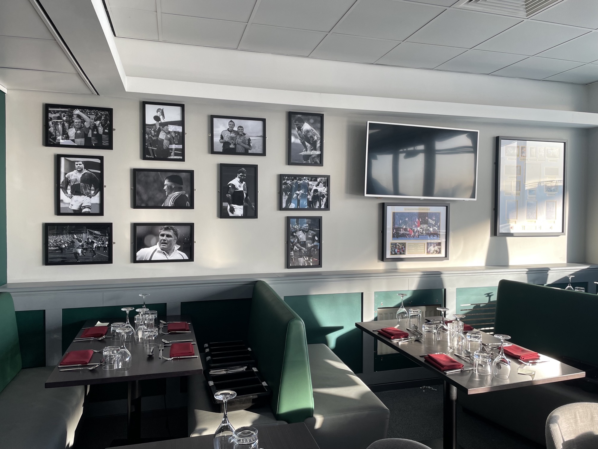 Stylish dining area in Jason Leonard Lounge, perfect for meetings and events at Twickenham Stoop.