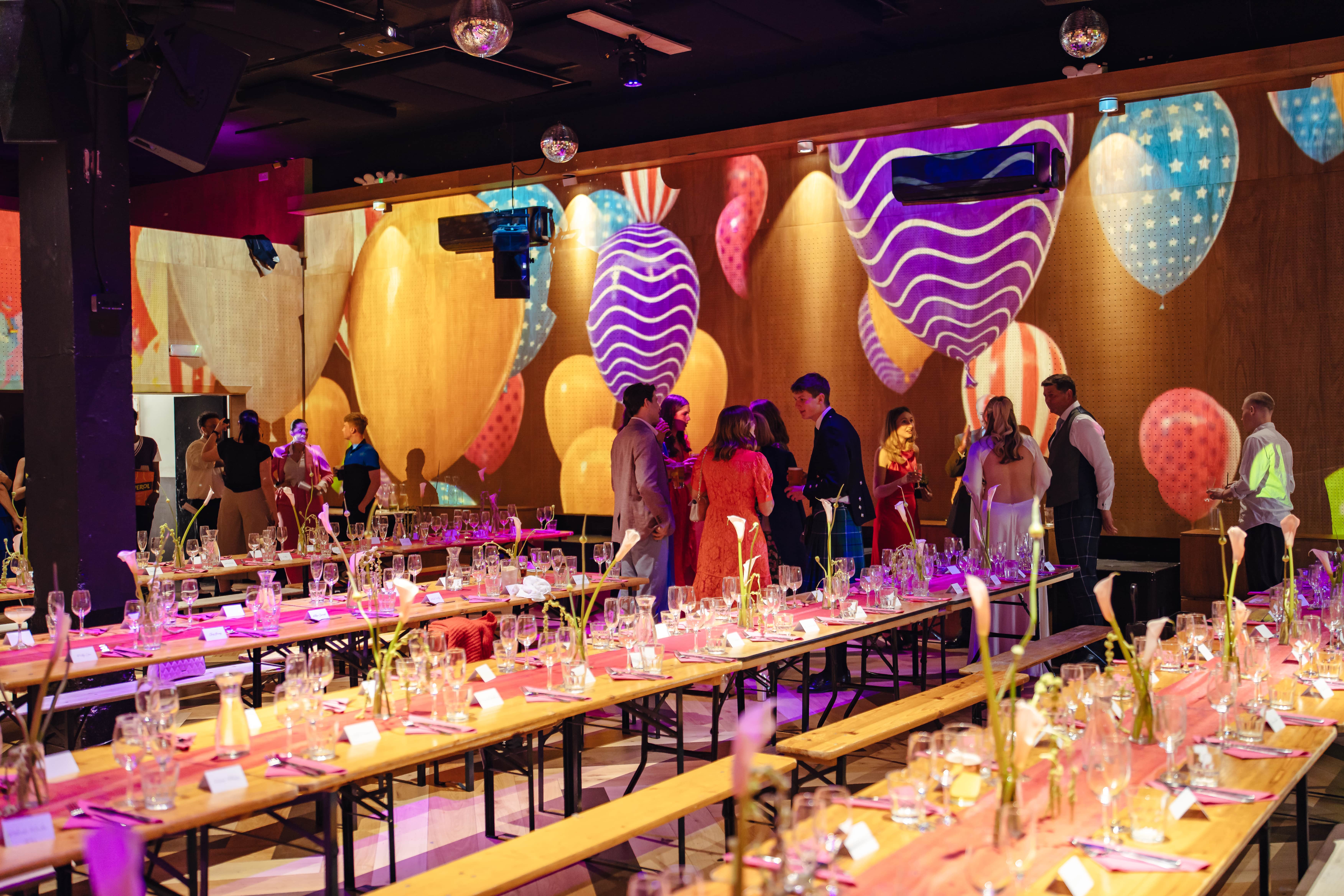 Vibrant event space with colorful decor for festive gatherings and corporate events.