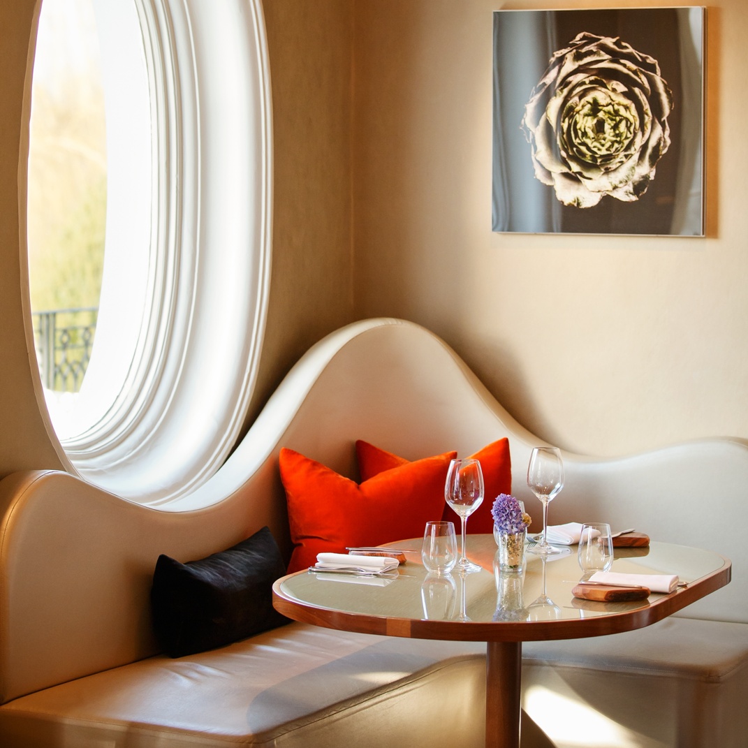 Elegant dining space with cozy seating, perfect for intimate events and client dinners.