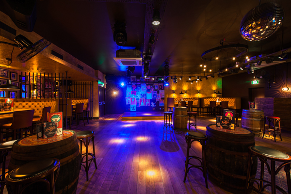 Casa & Havana event space in Nottingham with stylish seating and vibrant lighting for gatherings.