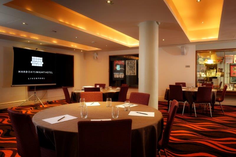 Hard Days Night Suite with round tables, ideal for corporate meetings in Liverpool.