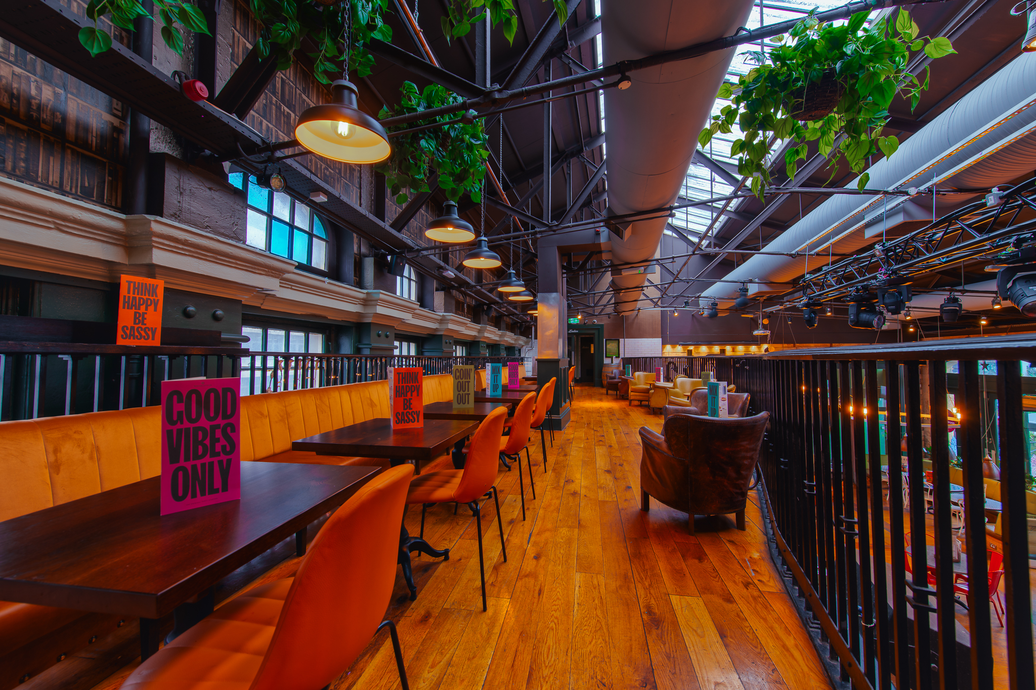 Modern event space in Revolution Bristol with warm wooden floors and vibrant atmosphere.