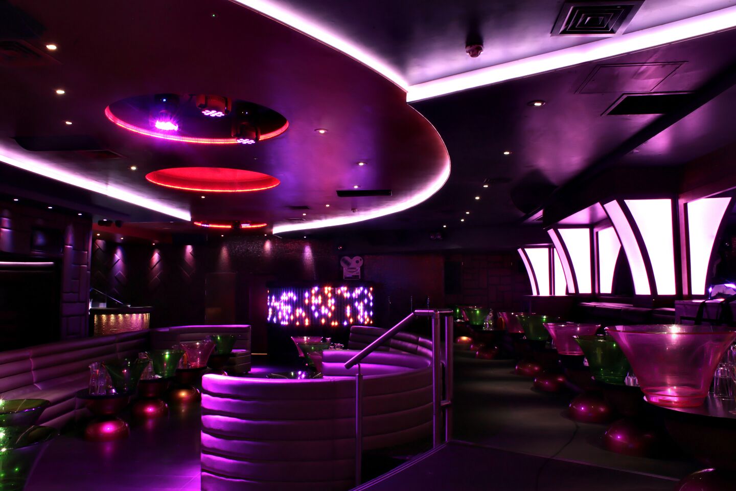 Modern event space at Maddox Club Mayfair with vibrant purple lighting for nightlife events.